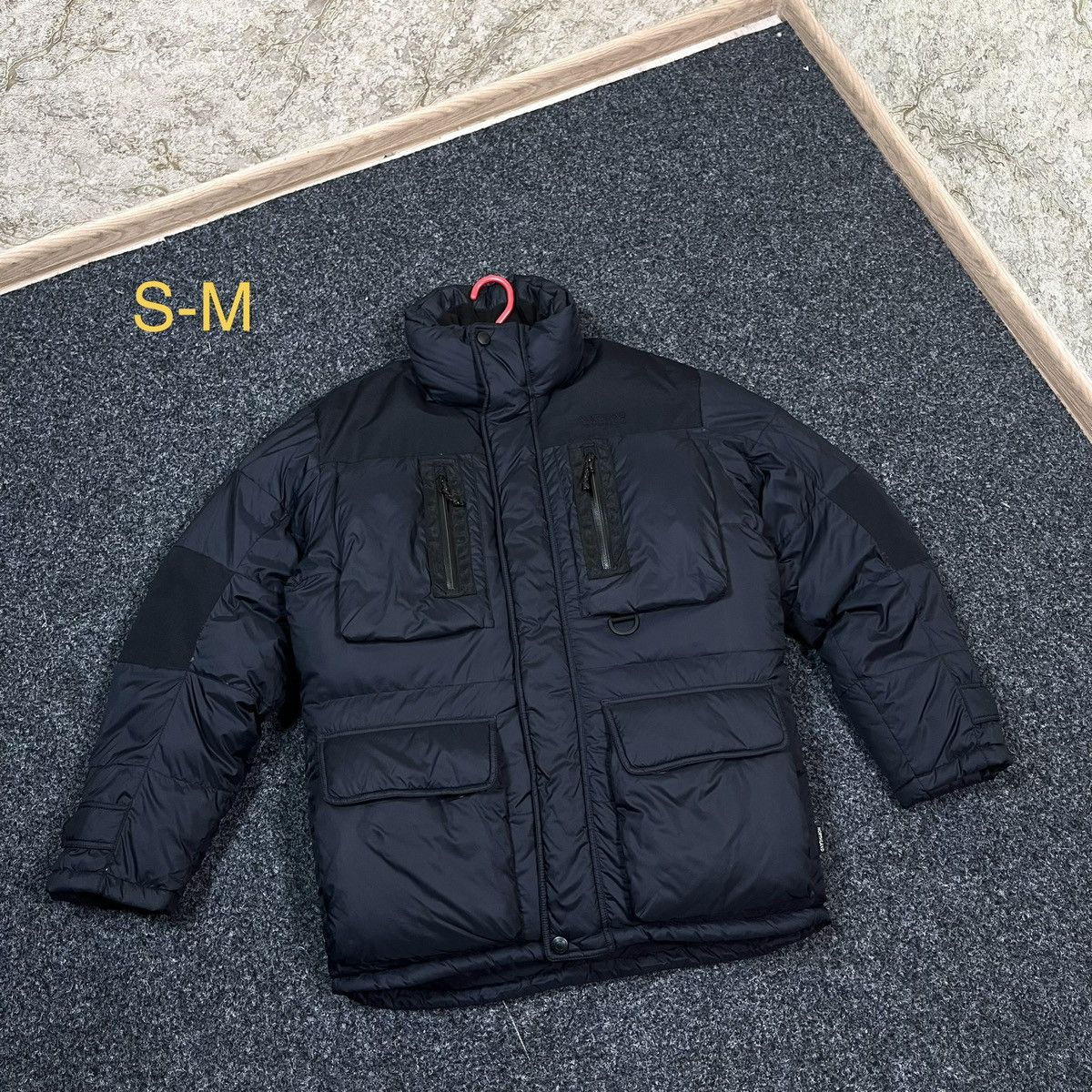 image of The Mountain x Vintage Puffer Down Jacket Northland Professional Vintage in Dark Blue (Size Small)