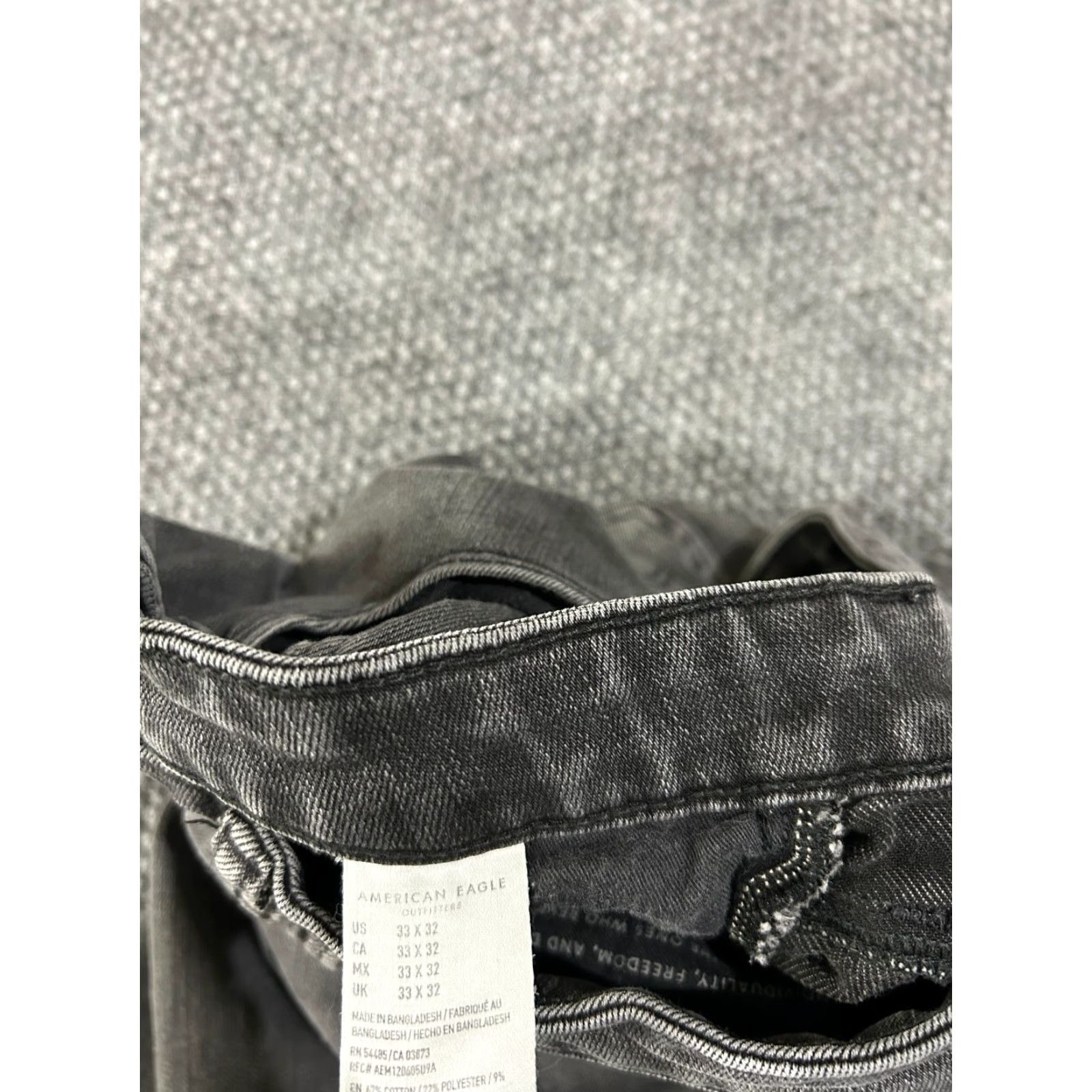 American Eagle Outfitters american eagle jeans mens 33x32 slim black distressed denim retro hem hole blemish Size US 33 - 7 Thumbnail