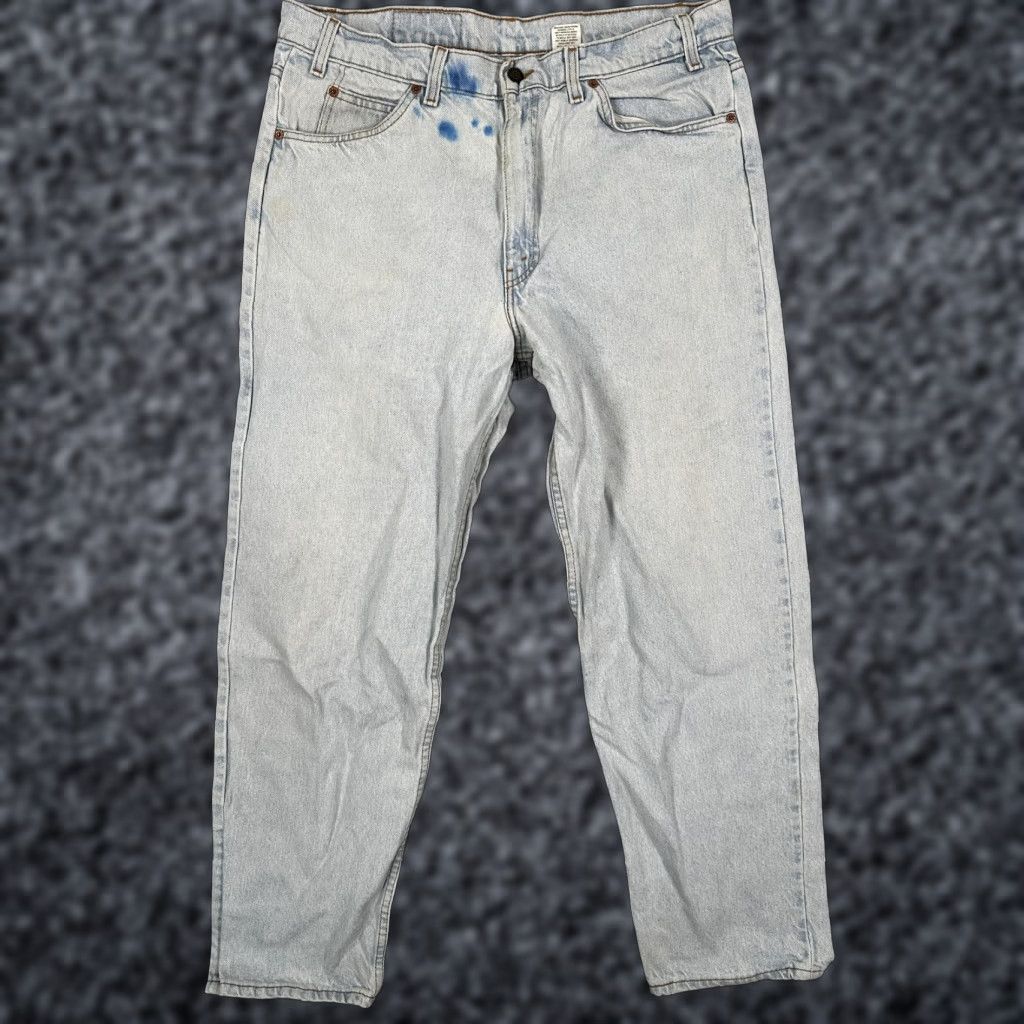 Levi's VINTAGE Levis 550 Jeans Mens 38x32 Light Wash Blue Relaxed Distressed Stained Grunge 90s Size US 38 / EU 54 - 1 Thumbnail