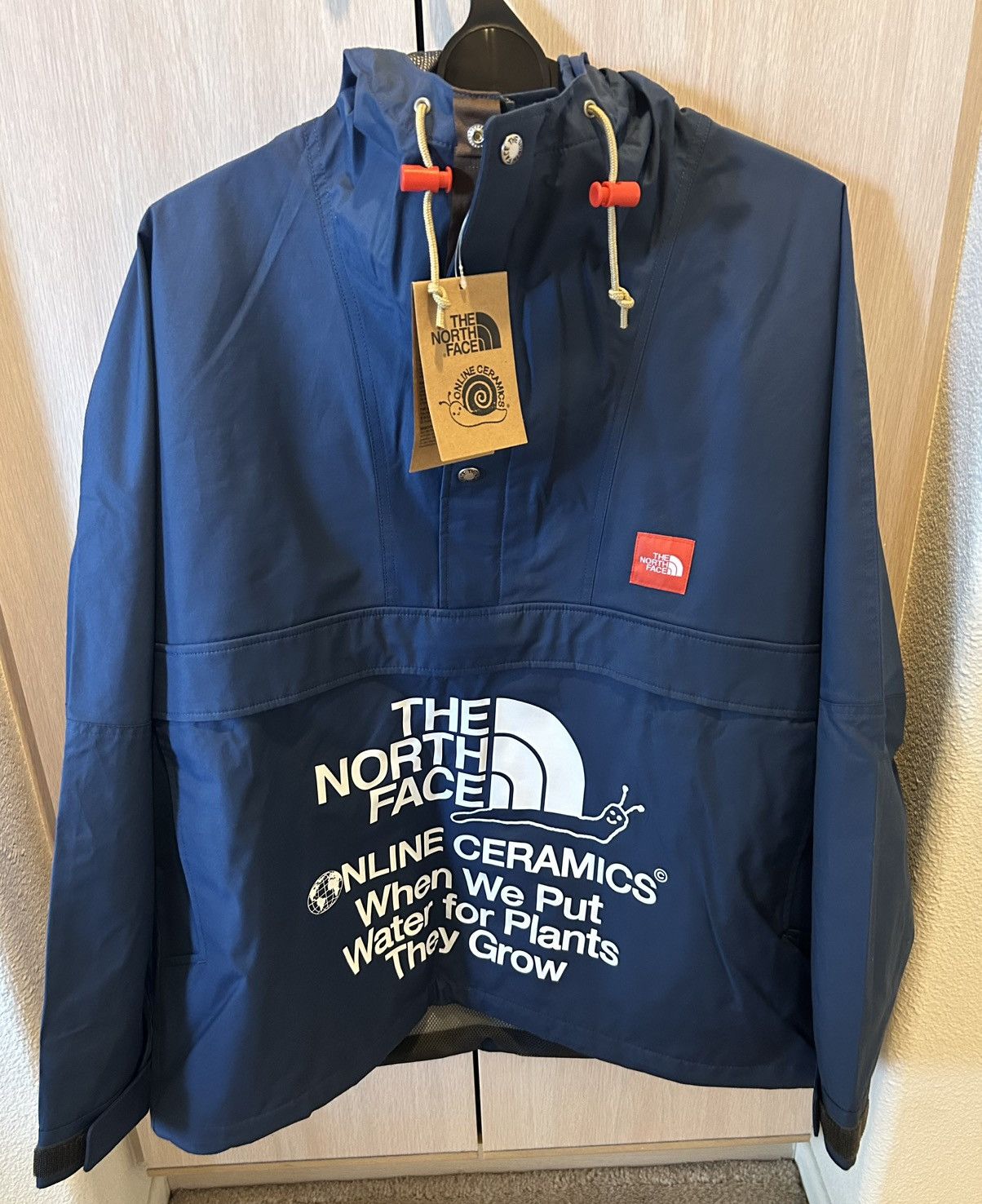 Online Ceramics × The North Face THE NORTH FACE X ONLINE CERAMICS MENS WIND JAMMER JACKET Size US S / EU 44-46 / 1 - 3 Thumbnail