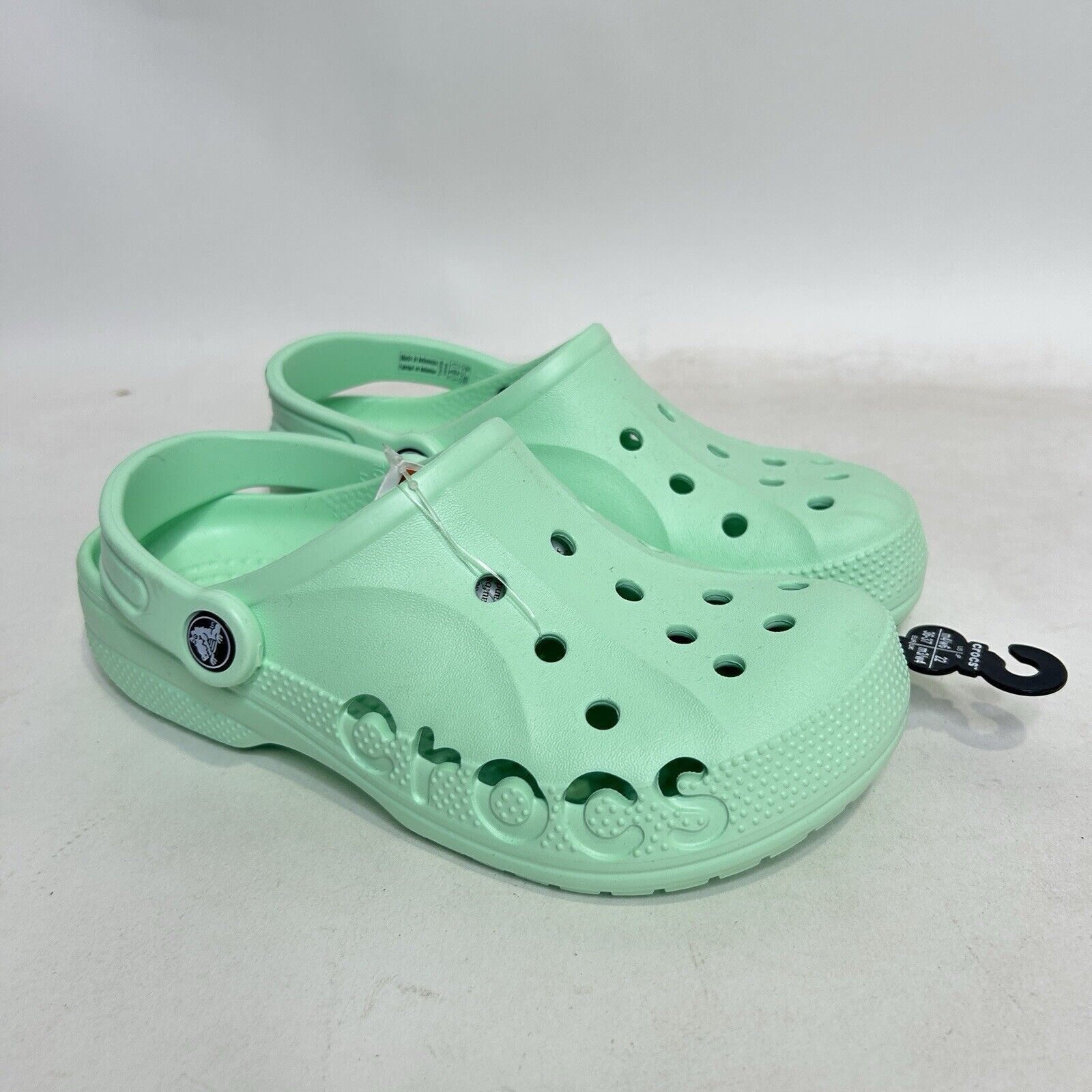 Mint green crocs best sale