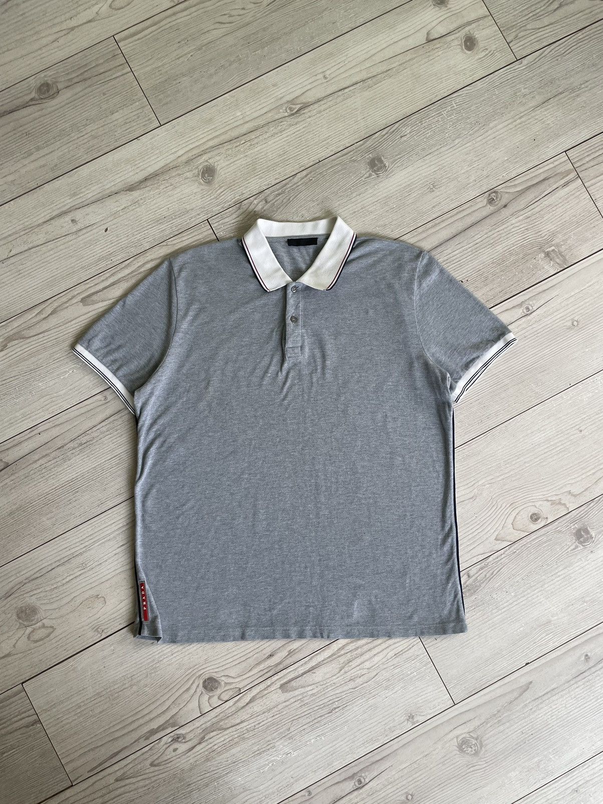 Image of Prada Milano Red Tab Logo Polo Shirt in Grey, Men's (Size 2XL)