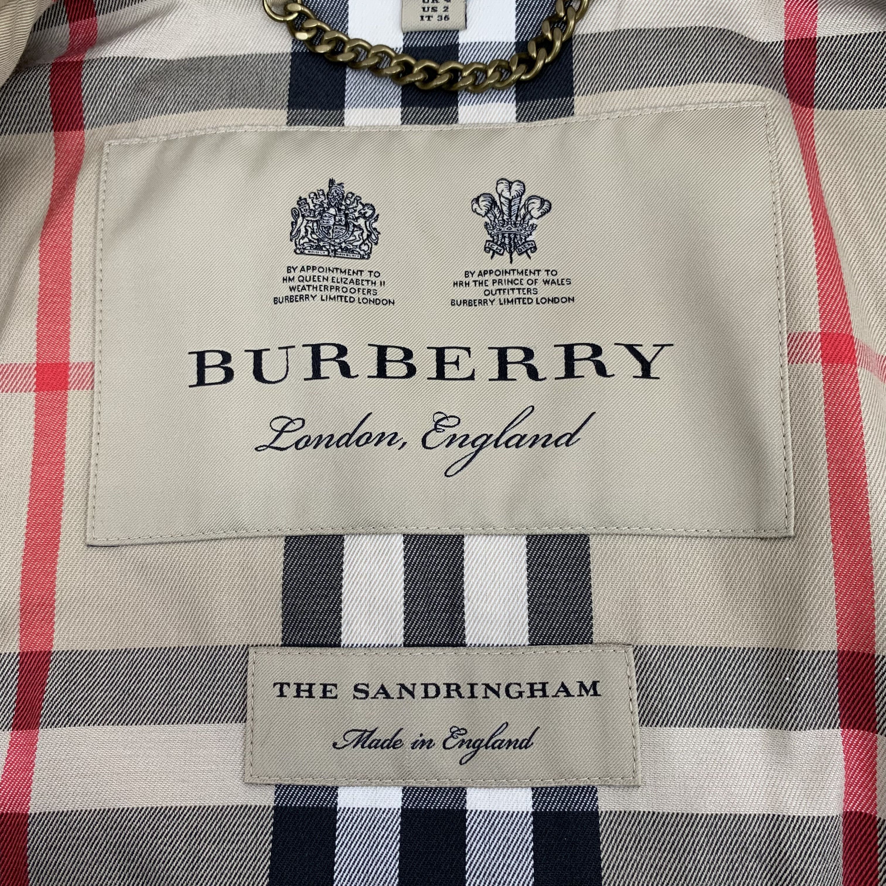 Burberry brown belted trench coat