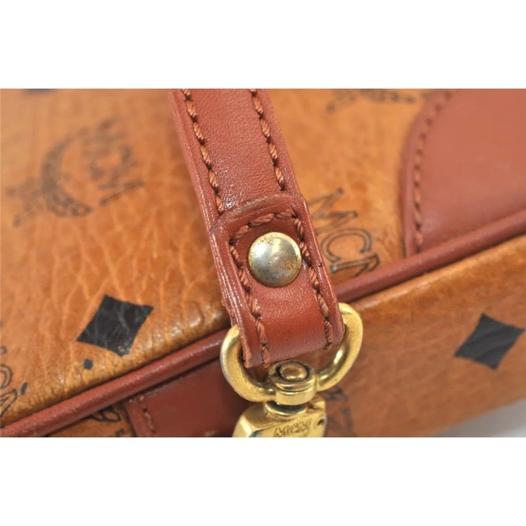MCM MCM Brown Clutch with Logo Pattern and Wrist Strap Size ONE SIZE - 9 Thumbnail