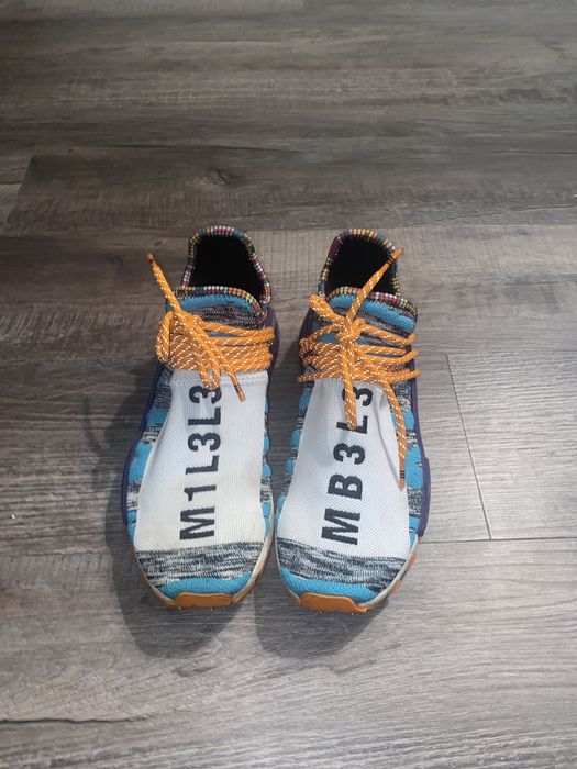 Nmd hu pharrell hot sale solar pack orange