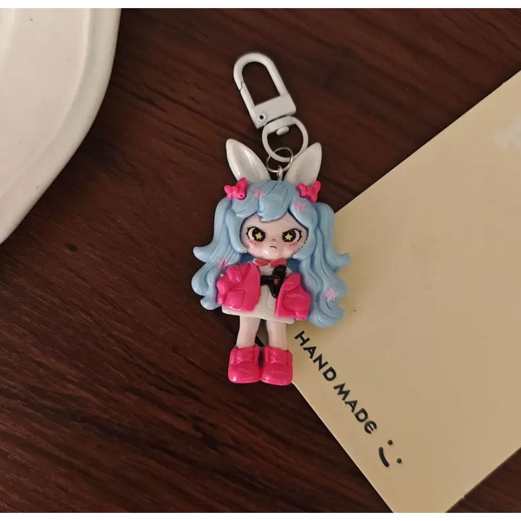 & Other Stories Cute Doll Phone Charm Keychain - Blue Size ONE SIZE - 1 Thumbnail
