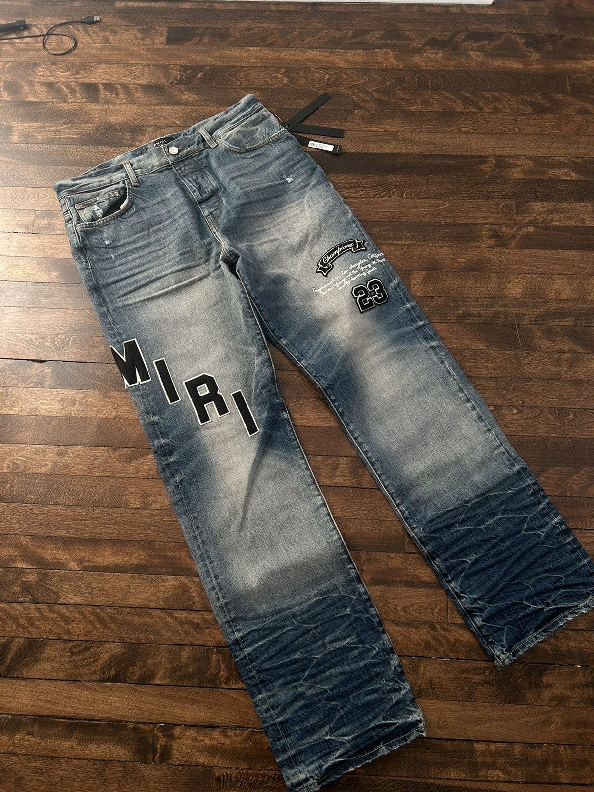 Image of Amiri Chenille Logo Denim in Blue, Men's (Size 36)