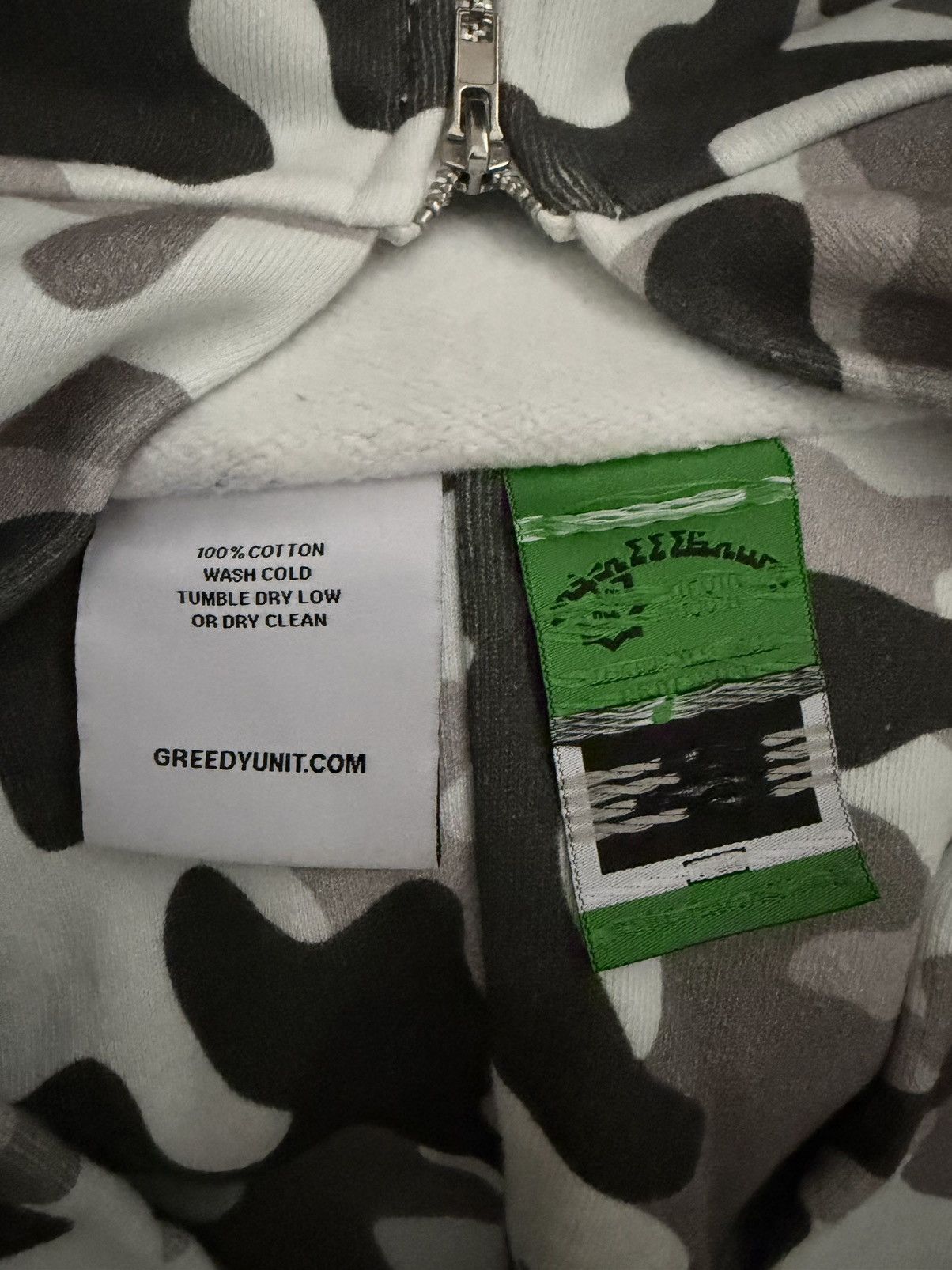 Greedy Unit × murd333r.fm Greedy Unit x Murd333r.Fm x ComplexCon ‘Camo’ Multi-Tag Zip Size US XL / EU 56 / 4 - 8 Thumbnail