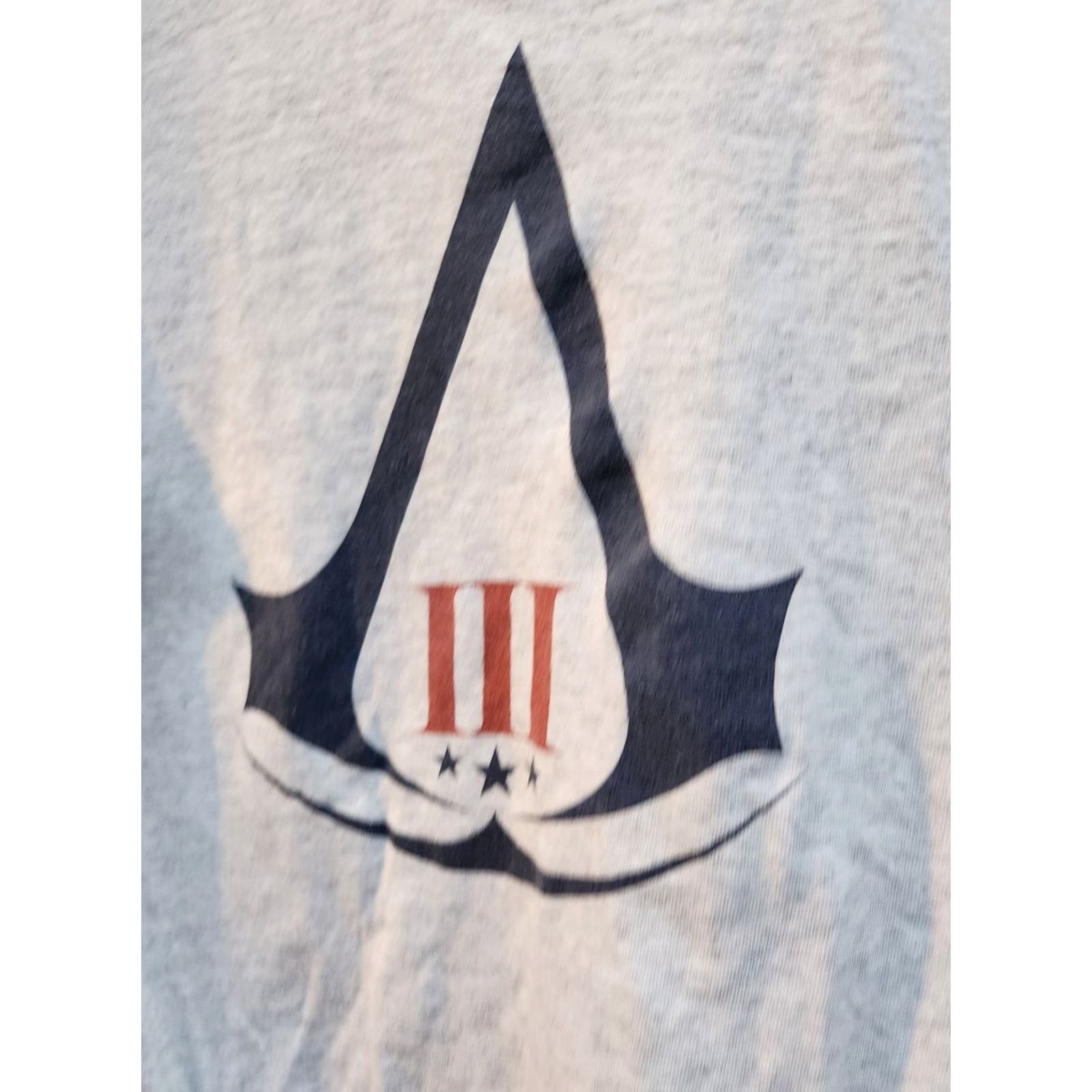 Vintage Ubisoft Assassin's Creed III 2012 Gray Graphic Video Game Promo Tshirt Size S Mens T-Shirt Logo Crew Neck Short Sleeve Cotton Regular Fit Size US S / EU 44-46 / 1 - 2 Thumbnail