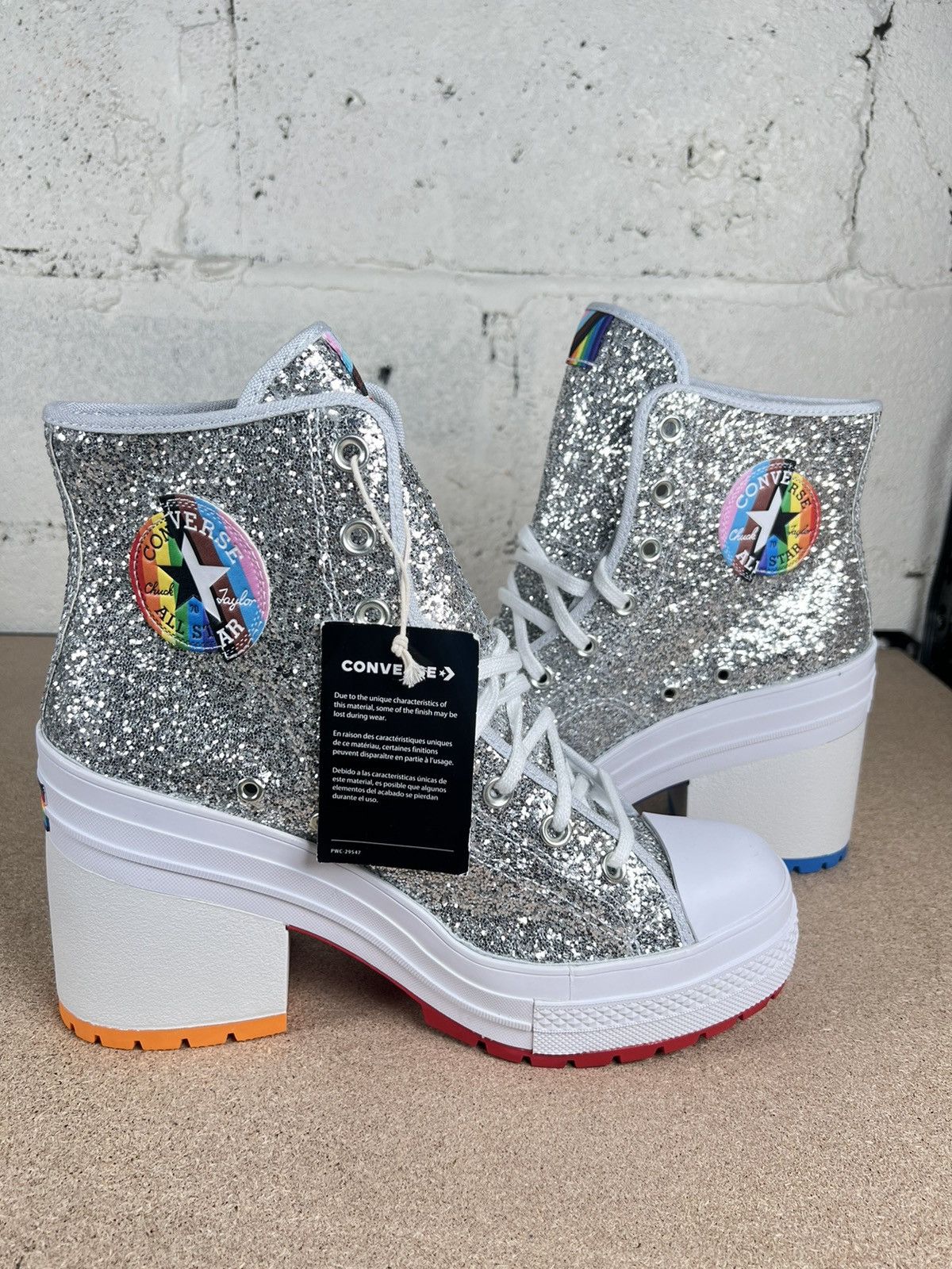Silver converse boots store