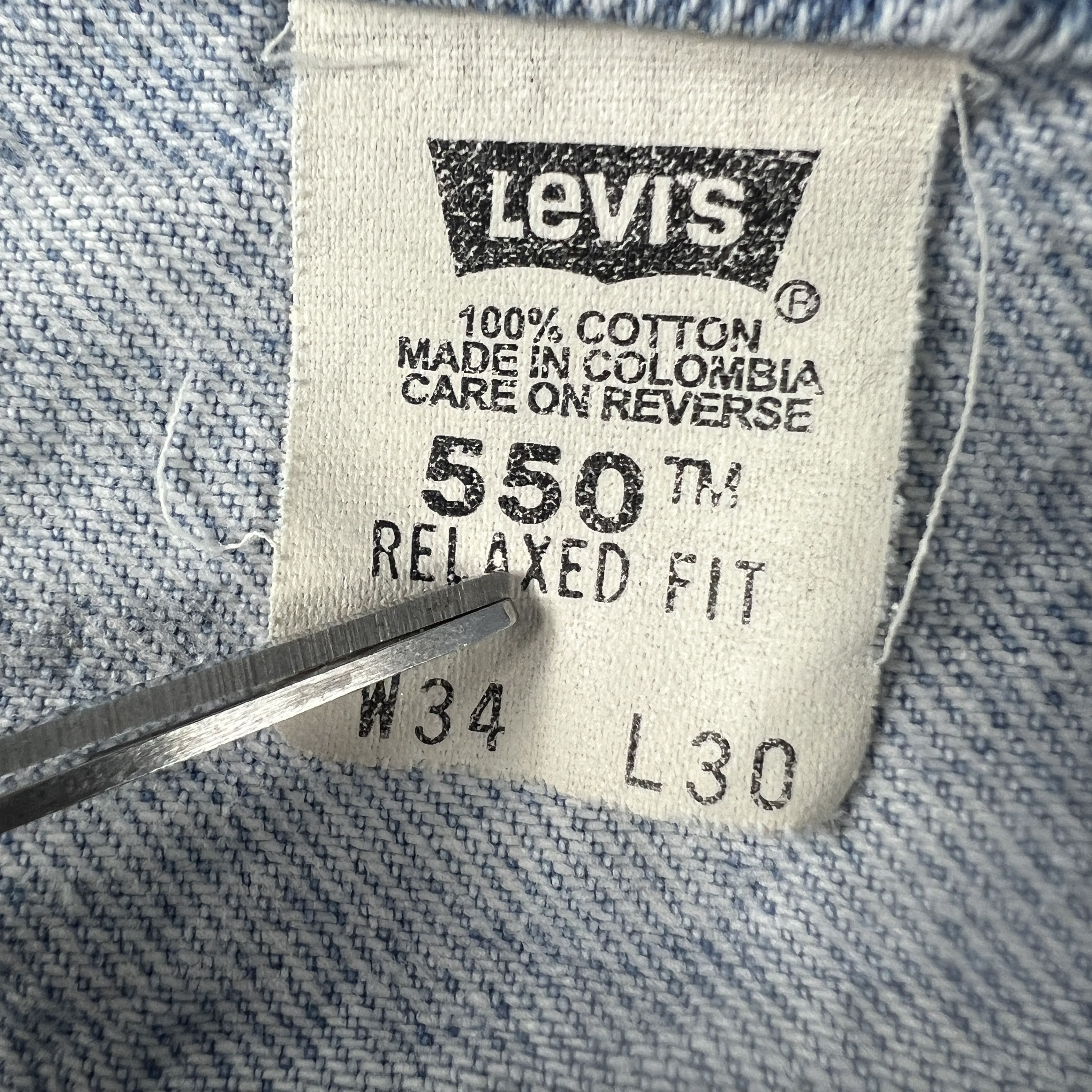 Levi's VTG Levi's Jeans 550 Relaxed Blue Thrashed Denim Orange Tab Size US 33 - 8 Thumbnail