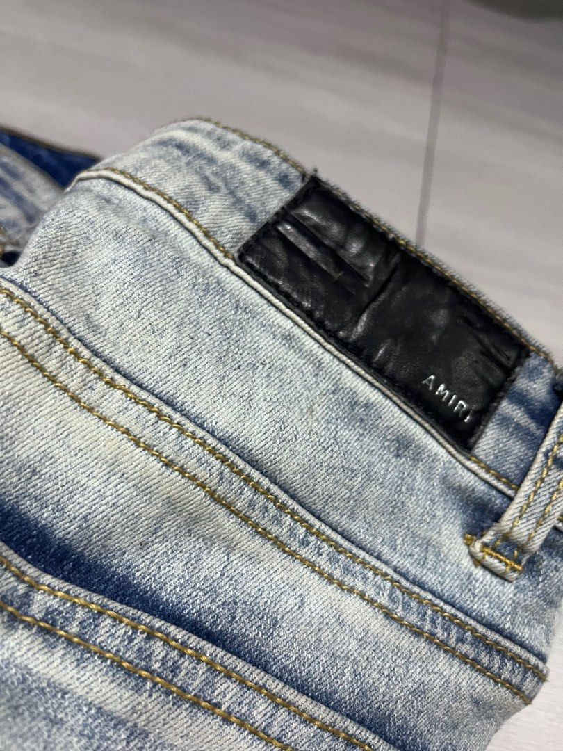 Amiri ripped distressed vintage denim faded