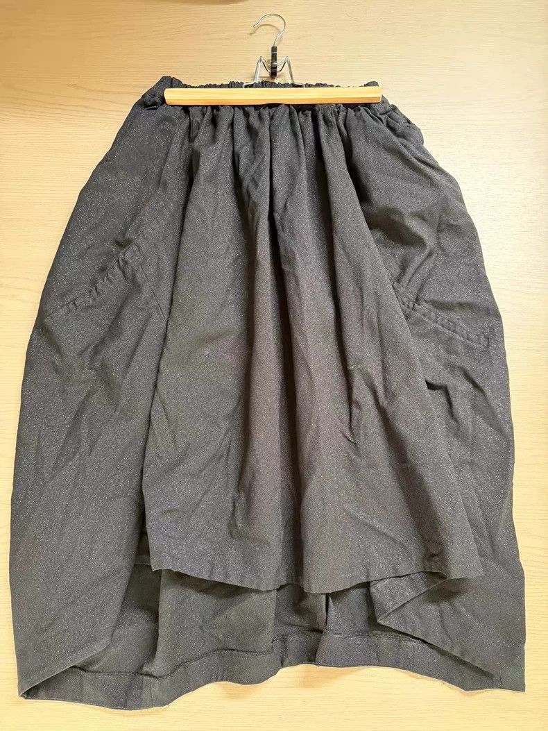 Comme Des Garcons size XS Overskirt's irregular tailoring