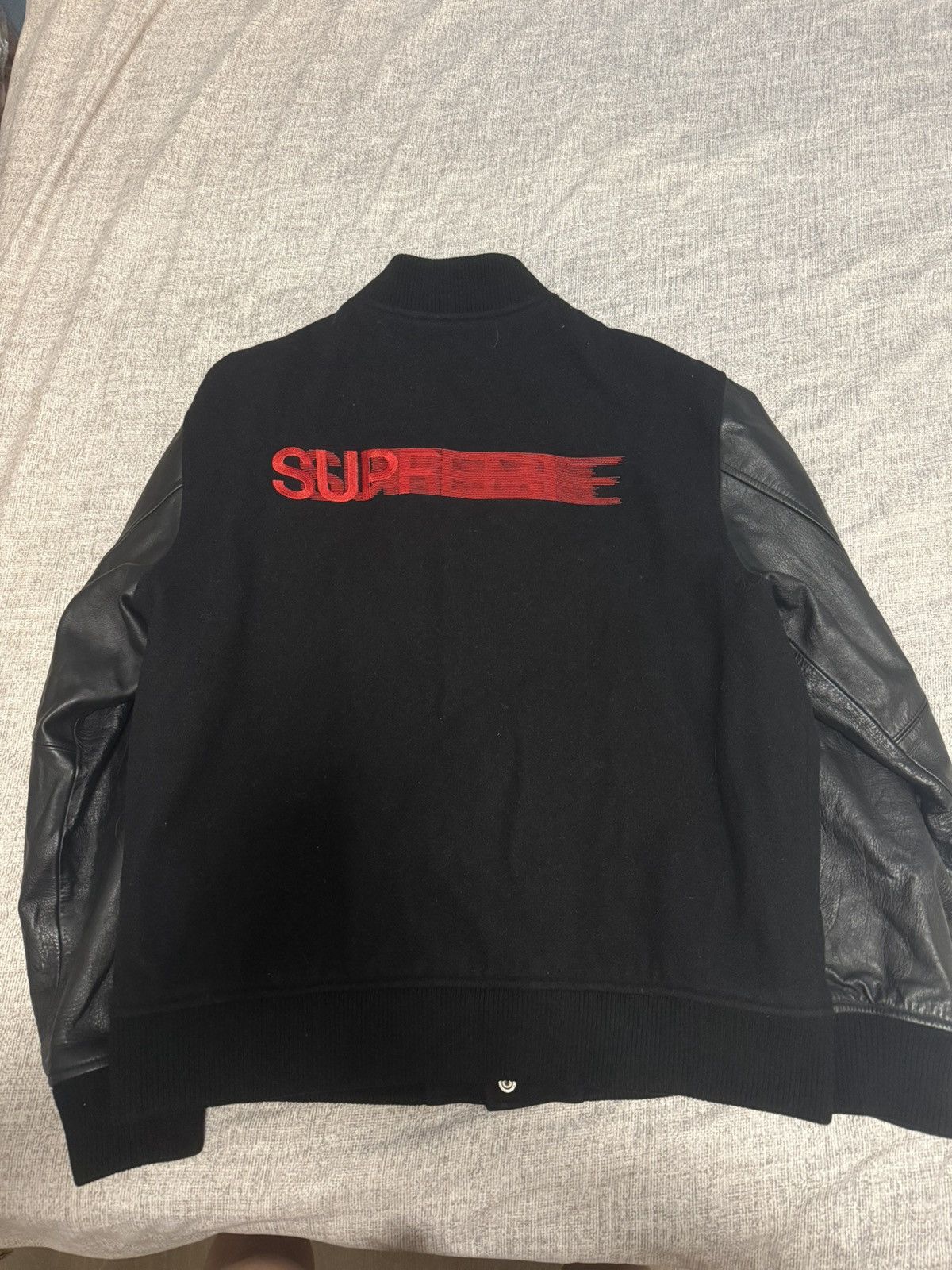SUPREME MOTION LOGO VARSITY JACKET L 黒 Supreme Motion Logo Varsity Jacket (FW18) - $398