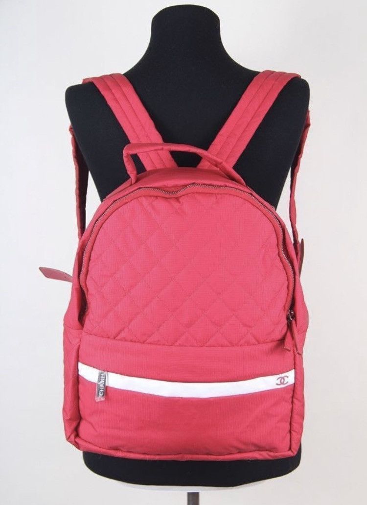 image of Chanel Logo Cc Detailed Backpack in Red, Men's