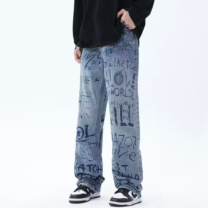 Graffiti faded blue jeans