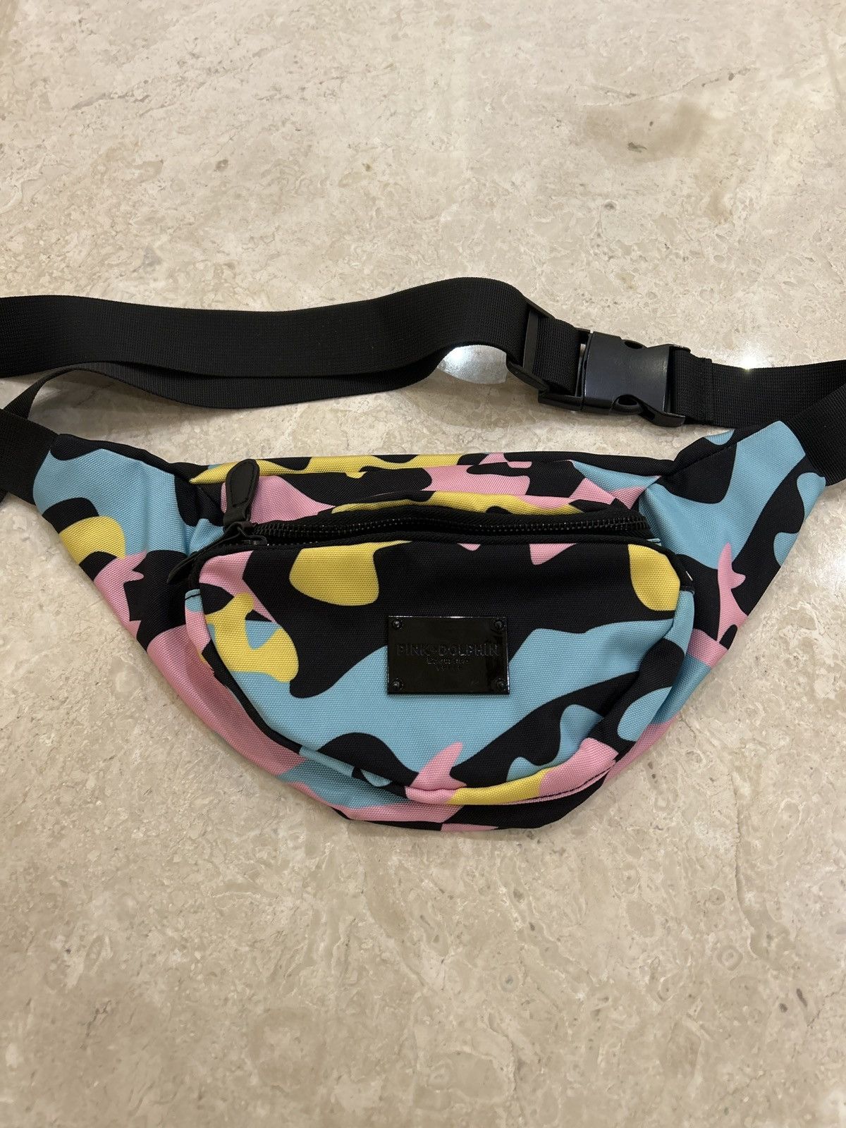 Pink dolphin fanny pack hotsell