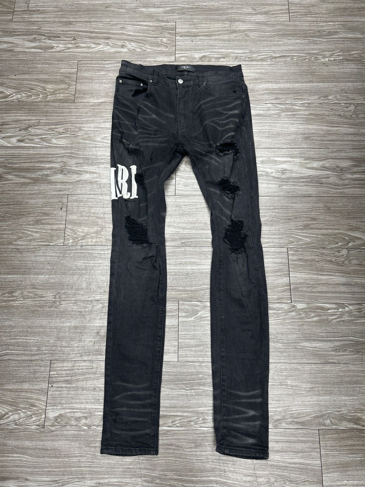 Amiri MX1 distressed skinny jeans in aged black