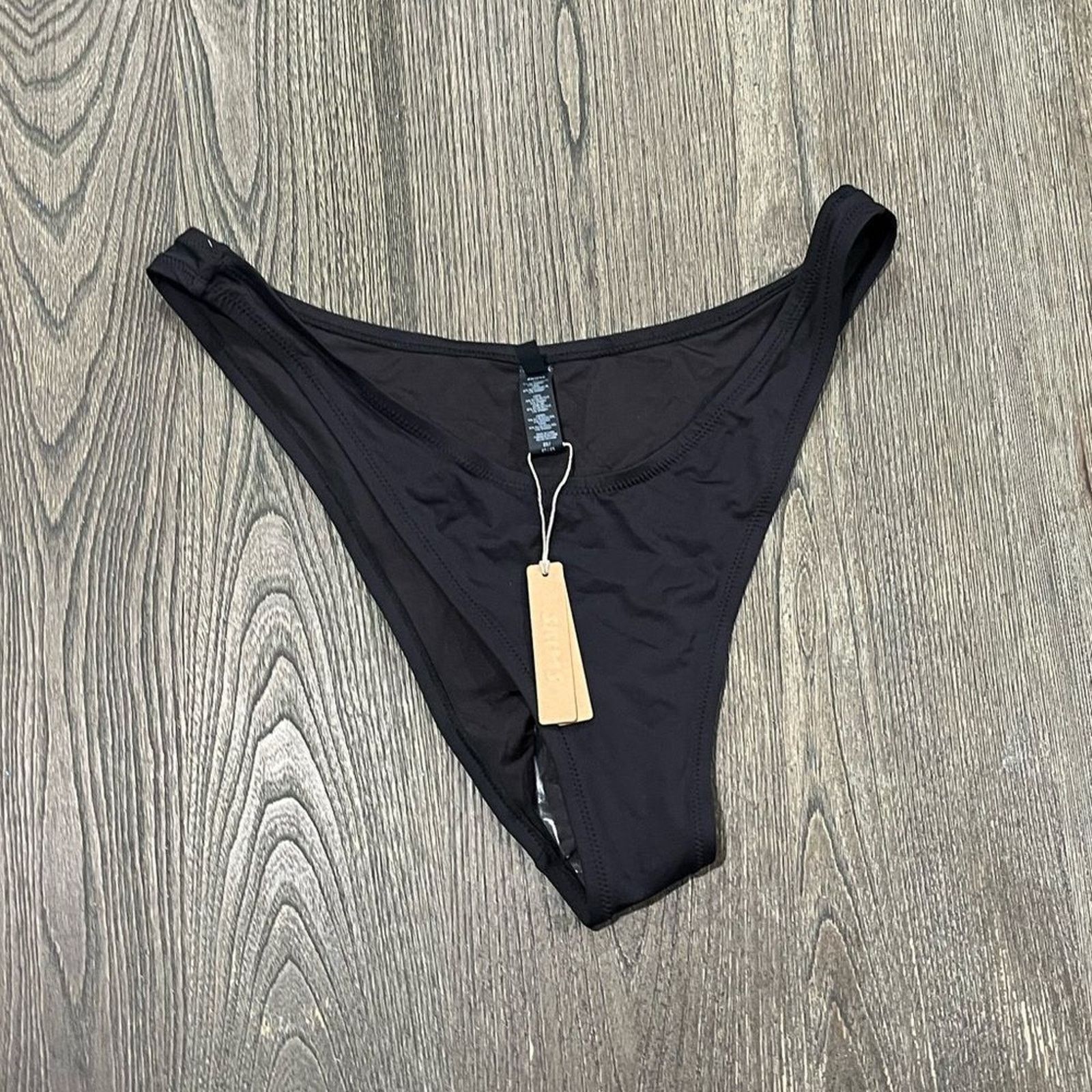 SKIMS NWT Skims Signature Swim Cheeky Tanga Bottoms Swimwear 2X Size ONE SIZE - 1 Thumbnail