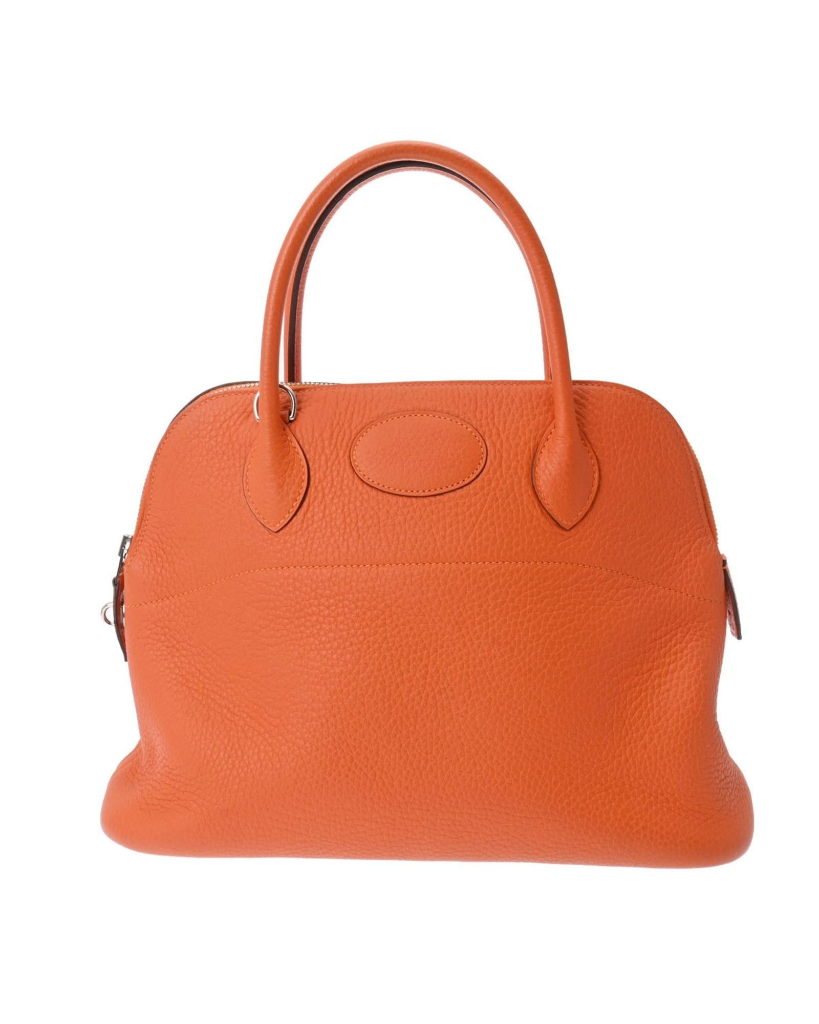 image of Hermes Elegant Leather Handbag With Zipper Closure in Orange, Women's