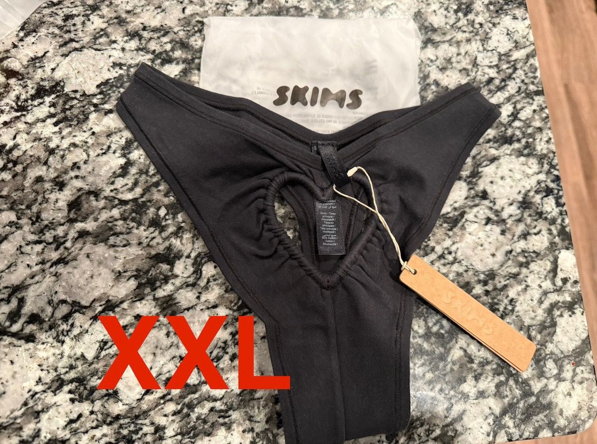 Kim Kardashian × SKIMS Skims Heart Dipped Thong Soot Black XXL 2X Size ONE SIZE - 1 Thumbnail