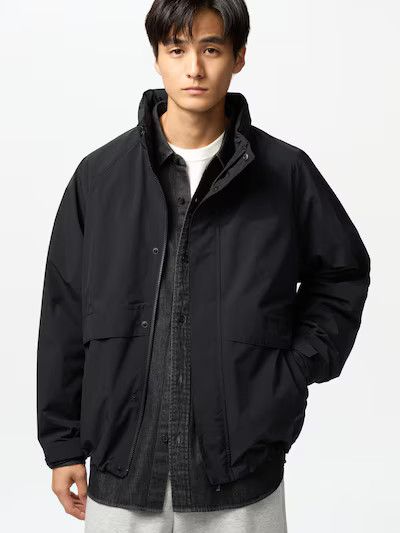 Uniqlo Uniqlo windproof stand blouson - black (XS) | Grailed