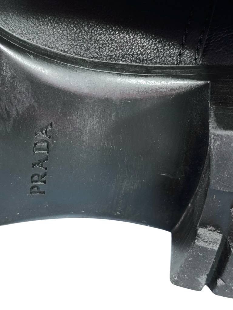 Prada black leather biker boots buckle high