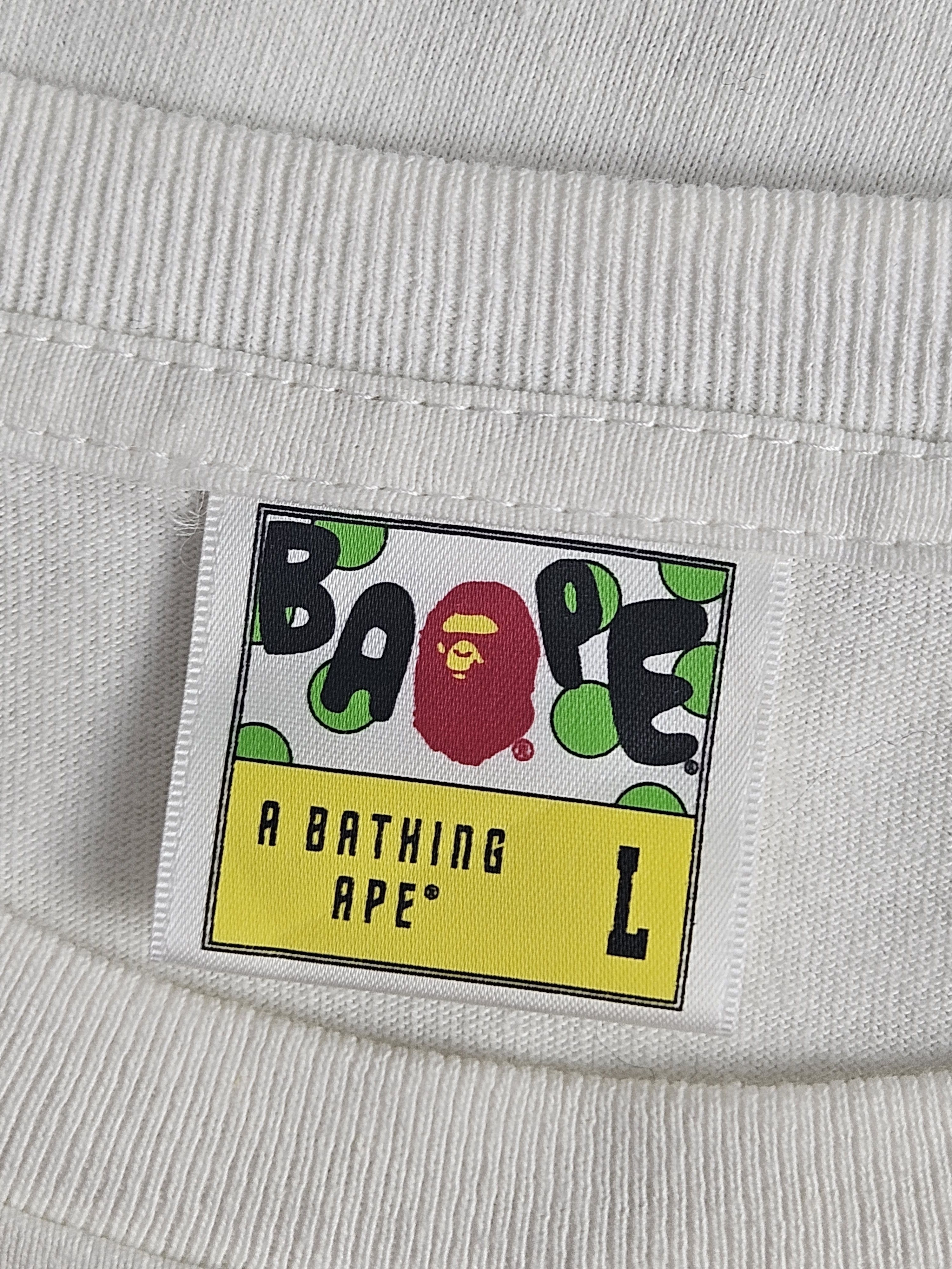 Bape × Undefeated A Bathing Ape BAPE x Undefeated Get Evolved exploited shirt Size US L / EU 52-54 / 3 - 6 Thumbnail