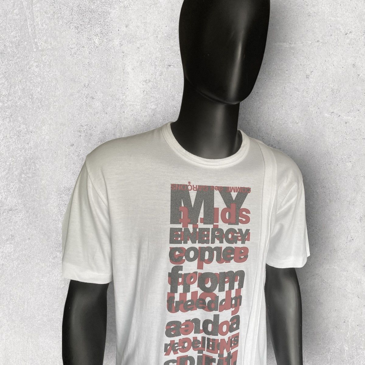 Comme des Garcons My Energy Comes From Freedom Tee | Grailed