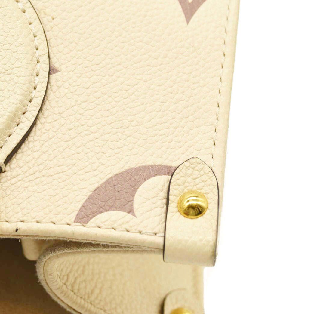 Louis Vuitton Louis Vuitton Empreinte Monogram Giant Onthego PM Creme Size ONE SIZE - 11 Thumbnail