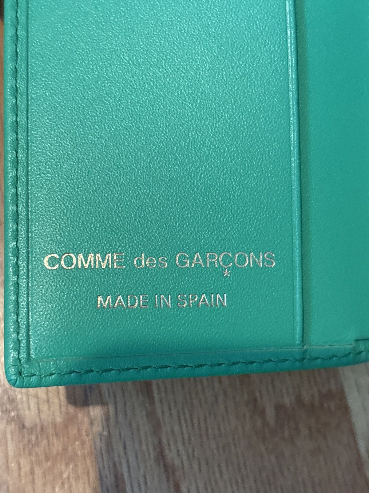 Comme des garcons green leather card holder wallet