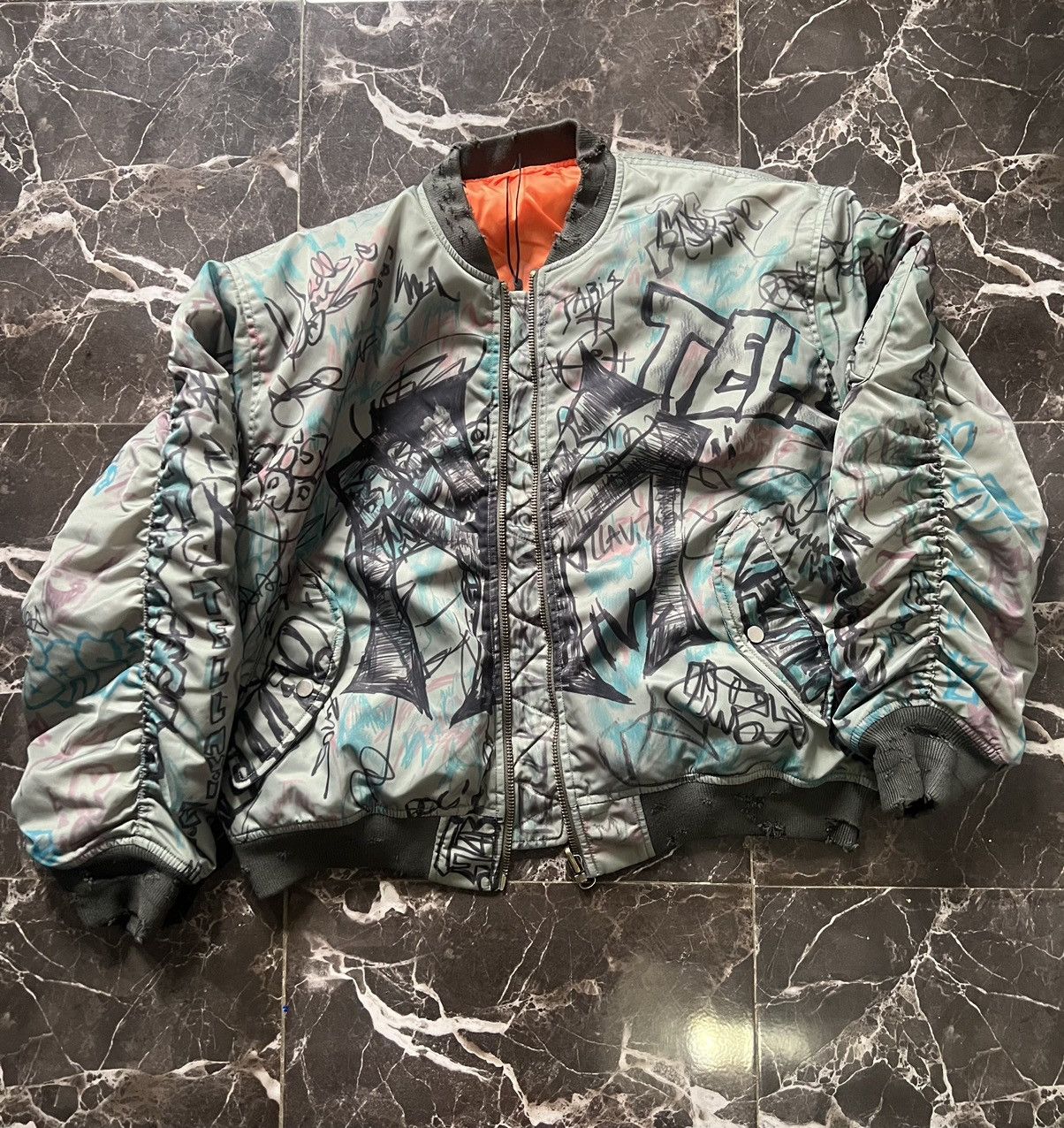 mowalola graffiti bomber jacket
