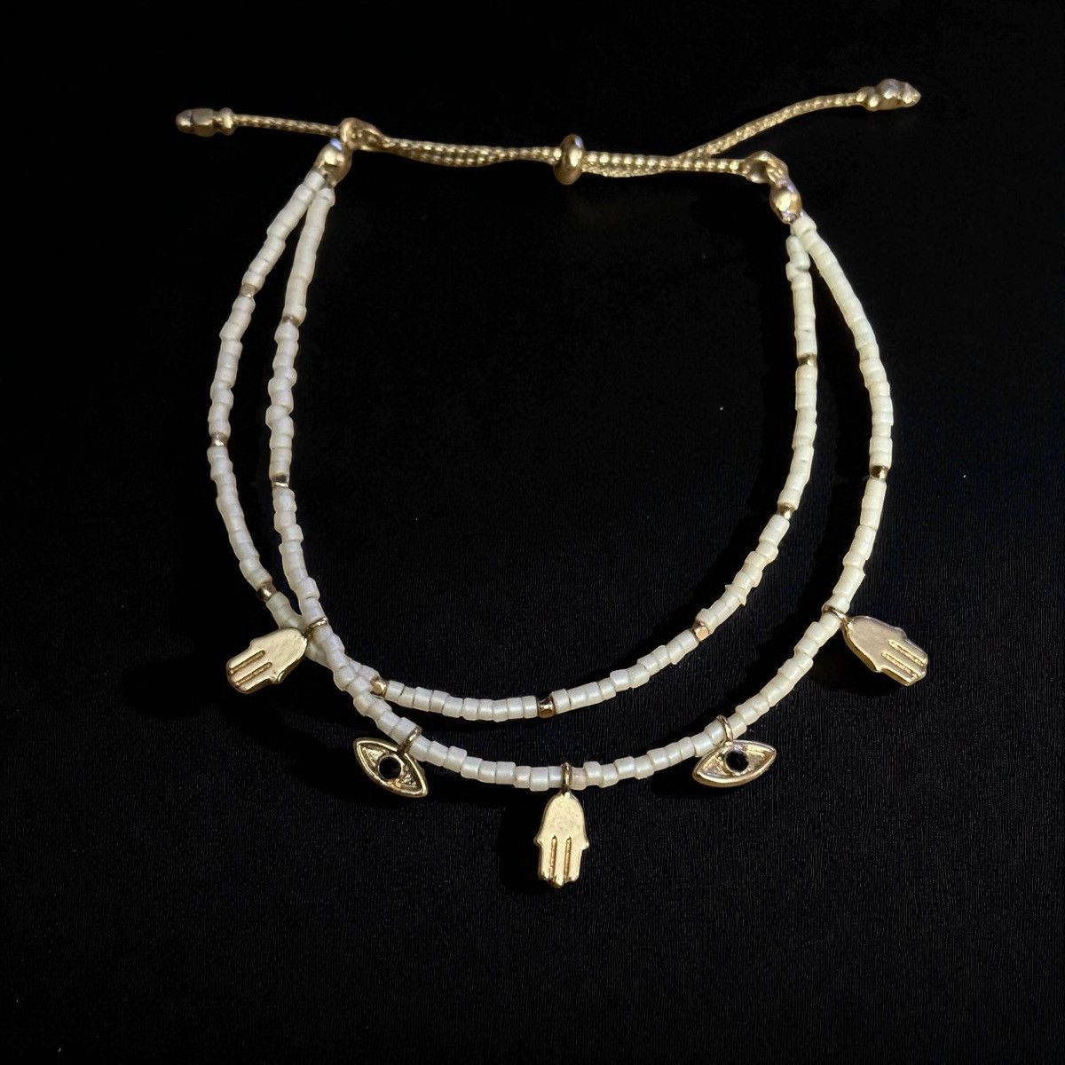 Other White beaded bolo bracelet with hamsa and evil eye charms Size ONE SIZE - 1 Thumbnail