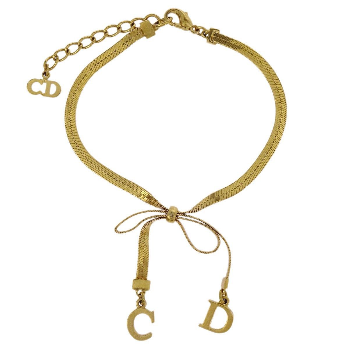 Dior Christian Dior Logo Bow Bracelet Metal Size ONE SIZE - 1 Thumbnail