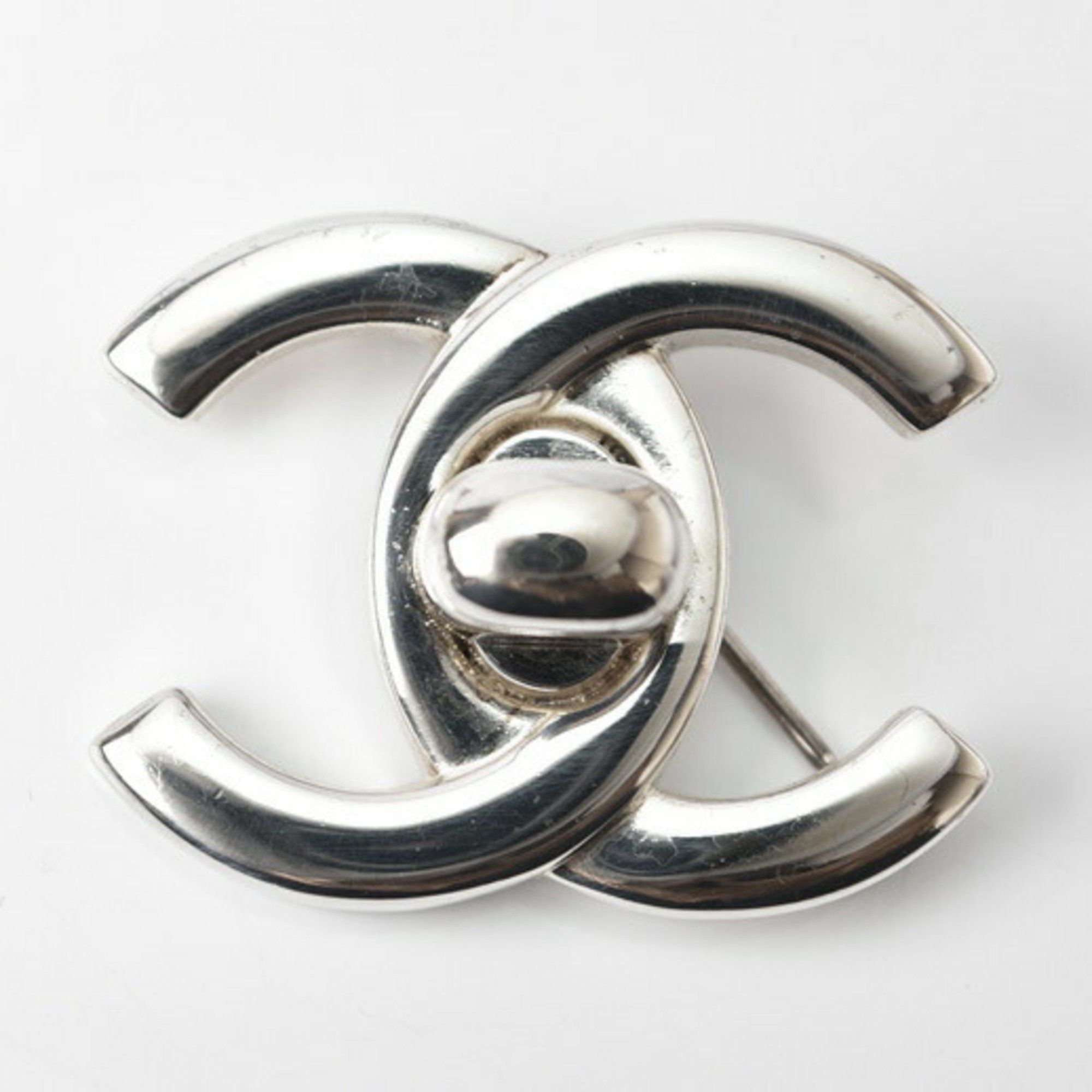 image of Chanel Brooch Pin Here Mark Turn Lock Motif Silver, Women's