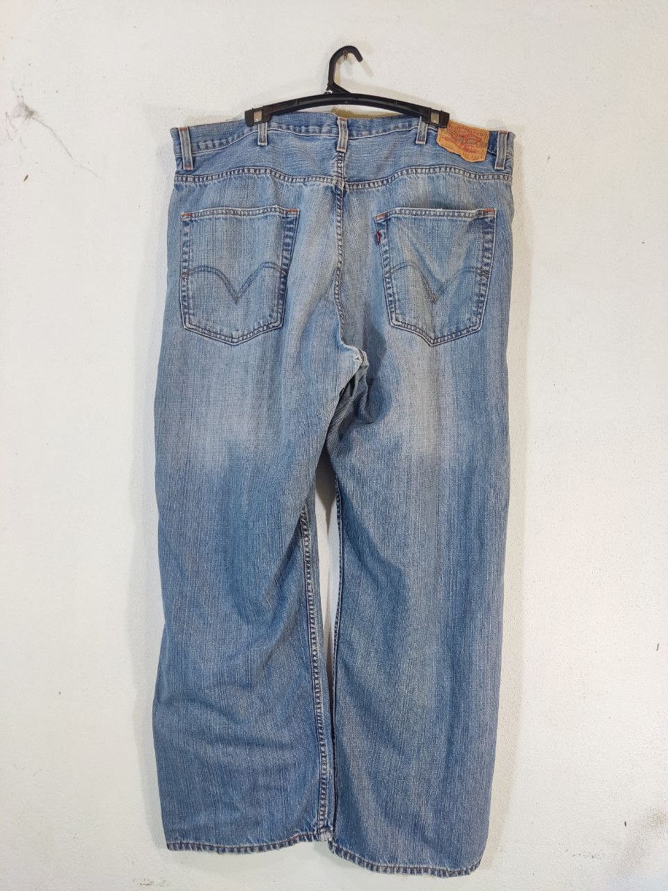 image of Vintage Levis 569 Loose Straight Distressed Denim in Light Blue Jeans, Men's (Size 44)