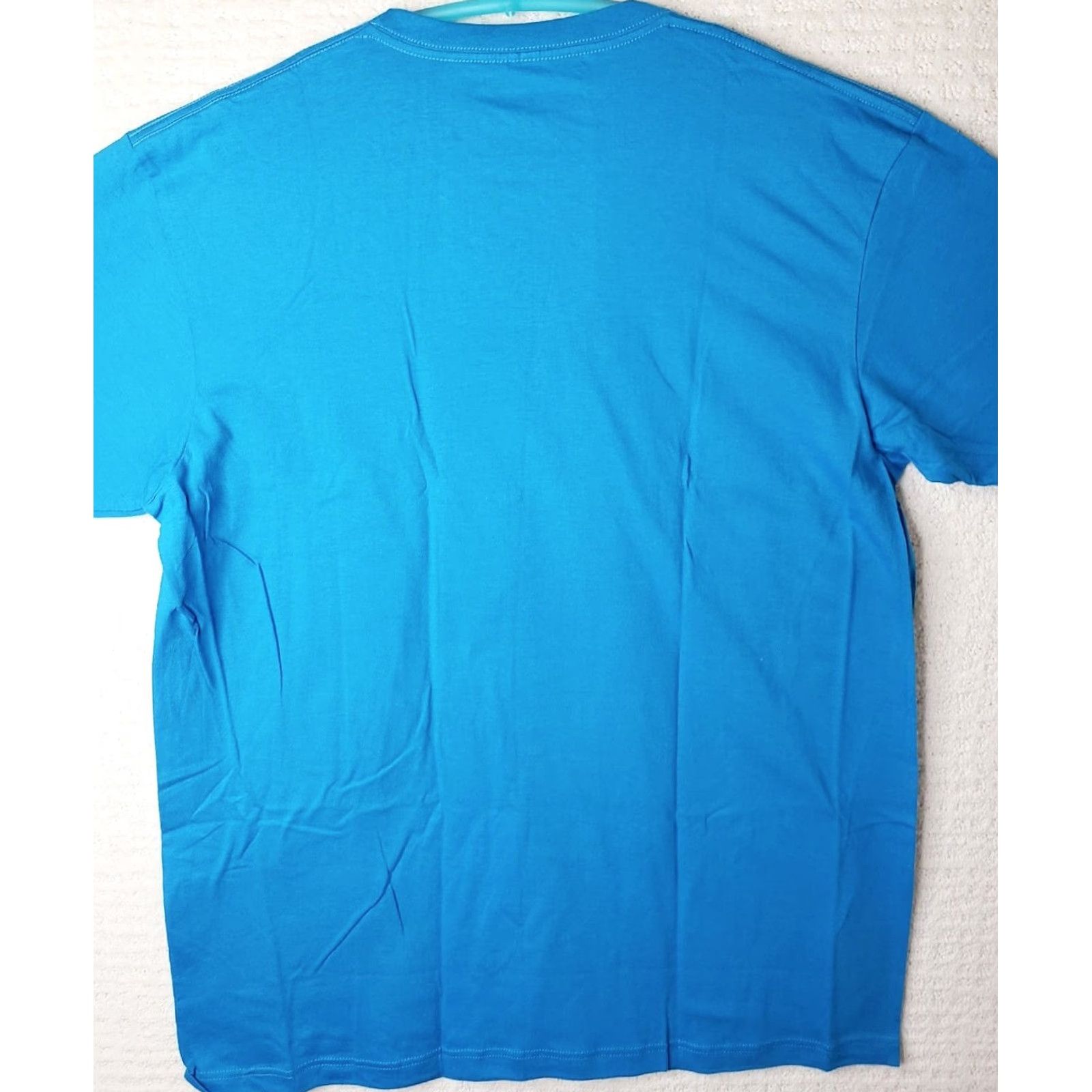 Vintage Tony Hawk T-Shirt Mens XL Blue Short Sleeve Crew Neck California Likes To Party Bear Logo Saying Graphic Print Jersey Solid Size US XL / EU 56 / 4 - 6 Thumbnail