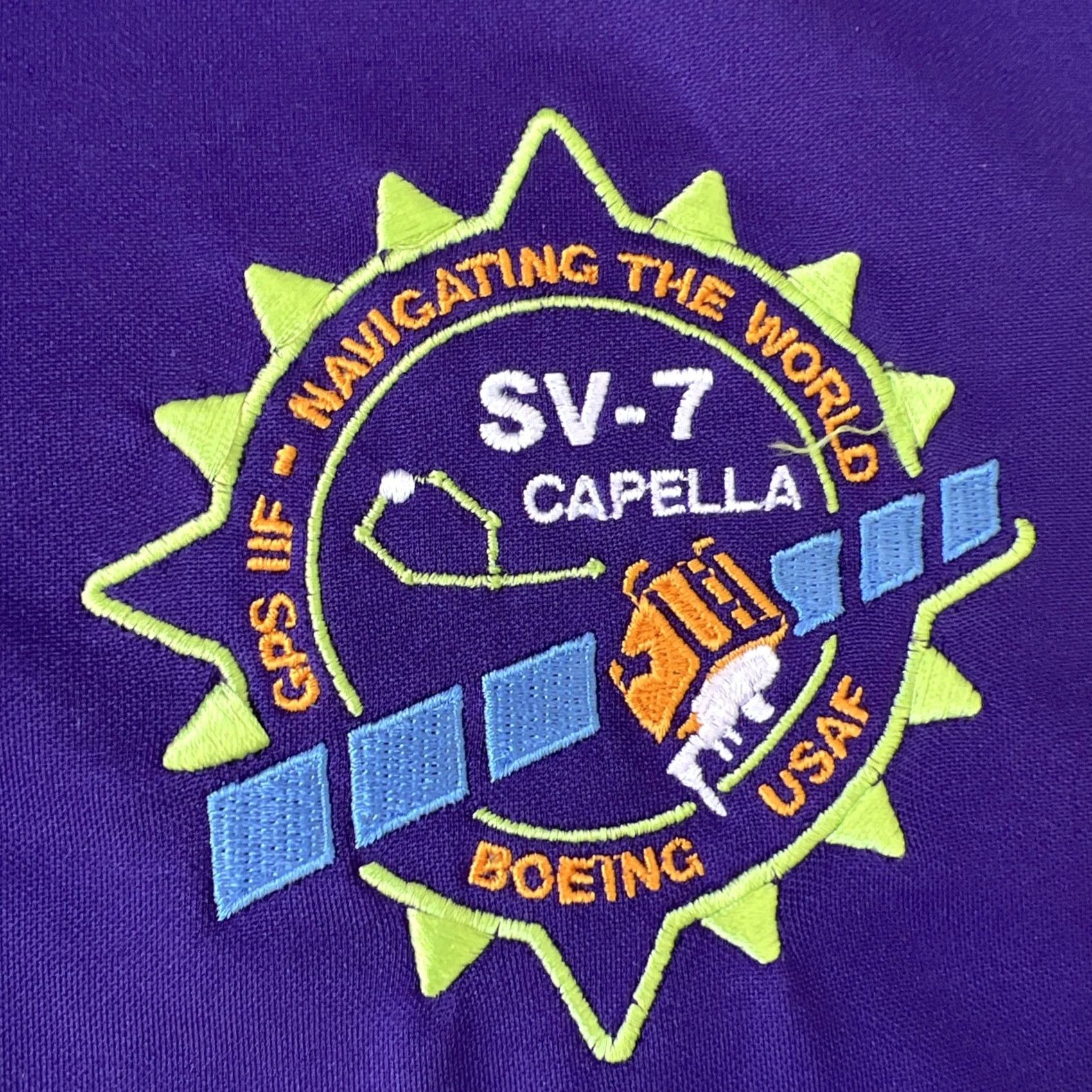 Vintage Boeing USAF GPS IIF SV-7 CAPELLA Navigating Polo Shirt M Purple Graphic Print Logo Shirt Mens Regular Short Sleeve Summer All Seasons Size US M / EU 48-50 / 2 - 3 Thumbnail