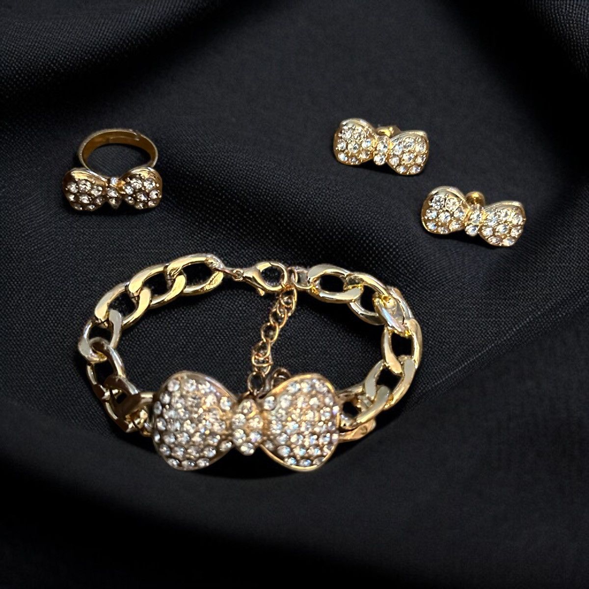 Other Gold tone pave bow tie bracelet, earrings and ring set Size ONE SIZE - 1 Thumbnail