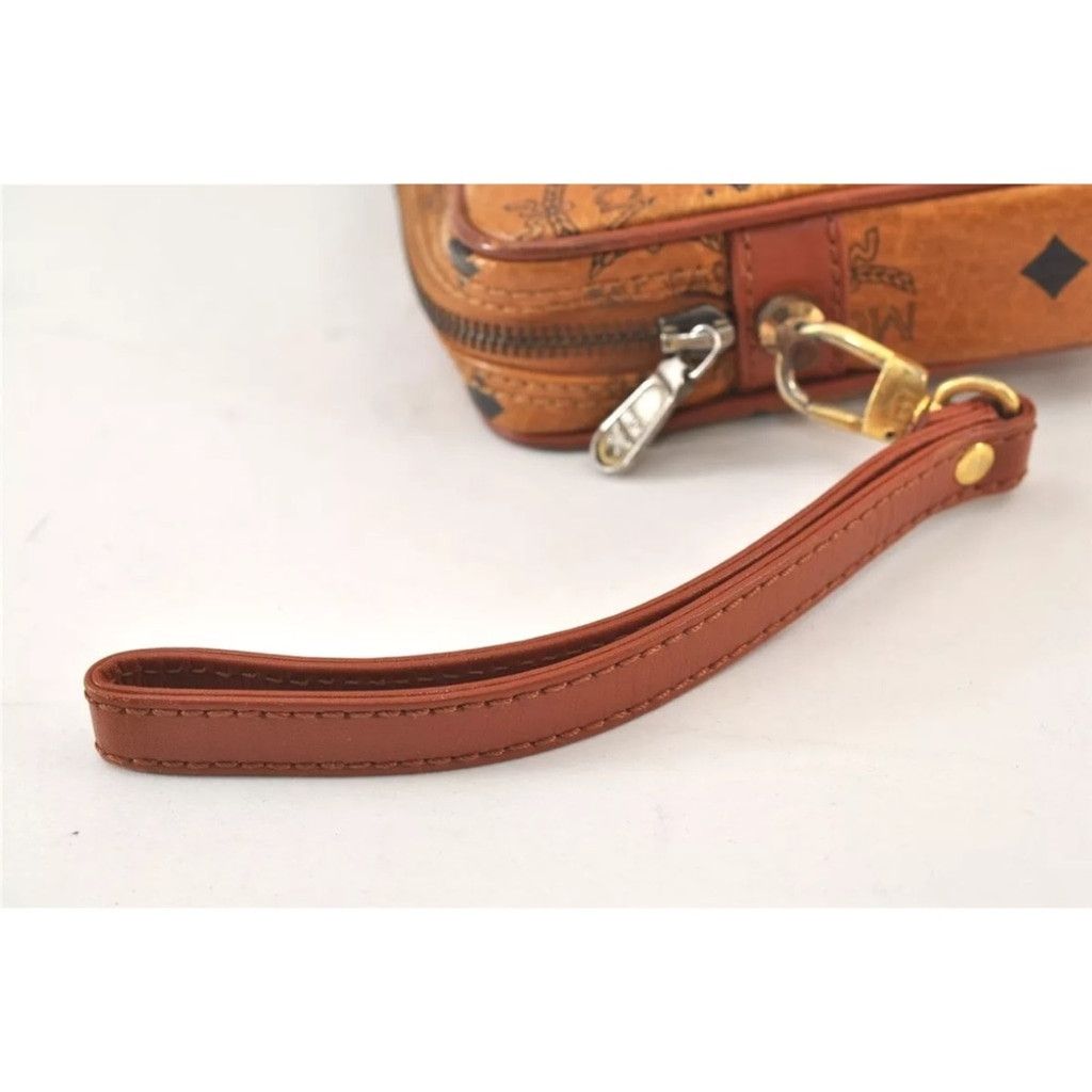 MCM MCM Brown Clutch with Logo Pattern and Wrist Strap Size ONE SIZE - 6 Thumbnail
