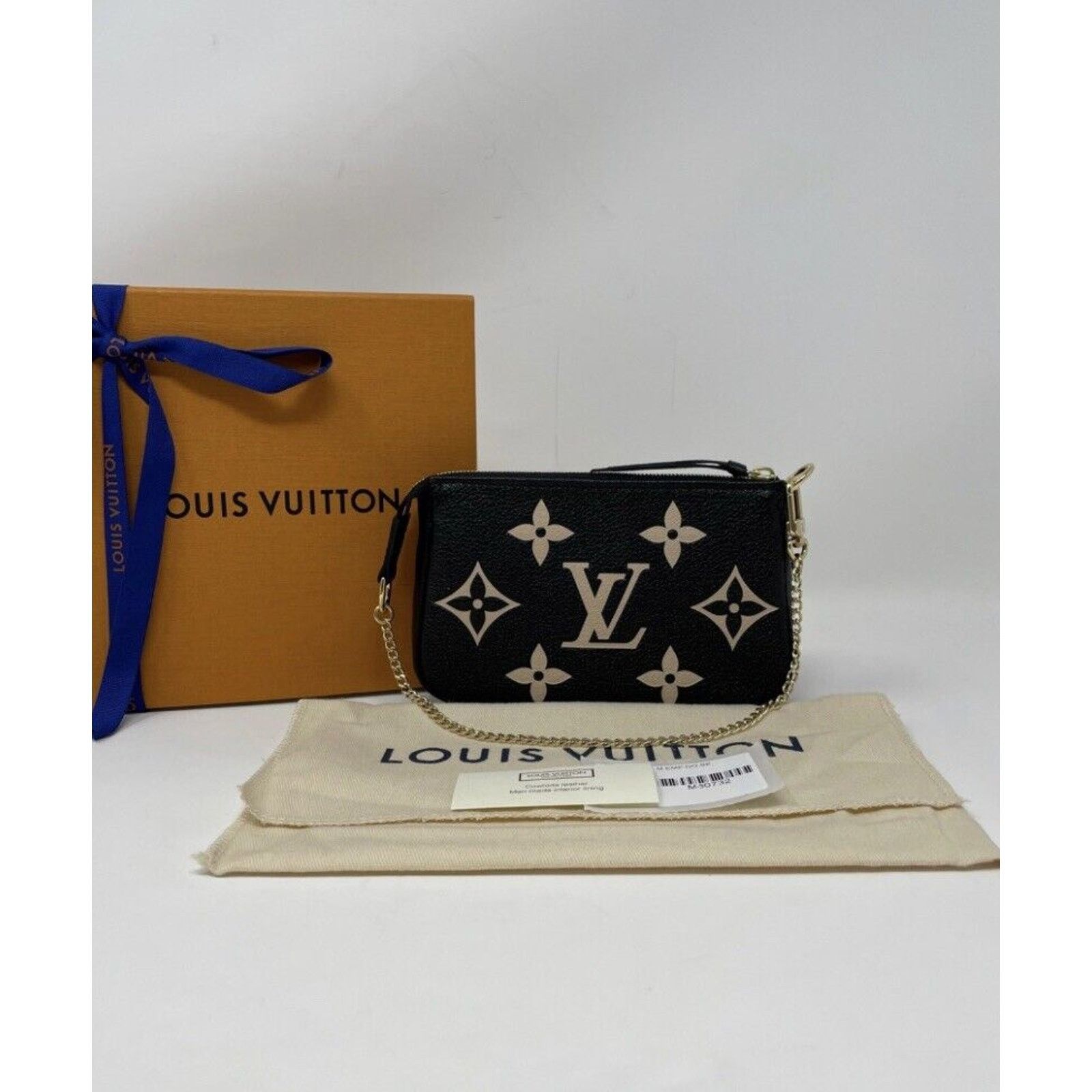 Louis Vuitton Mini Pochette Bicolor Empreinte Accessoires Pouch Black Size ONE SIZE - 3 Thumbnail