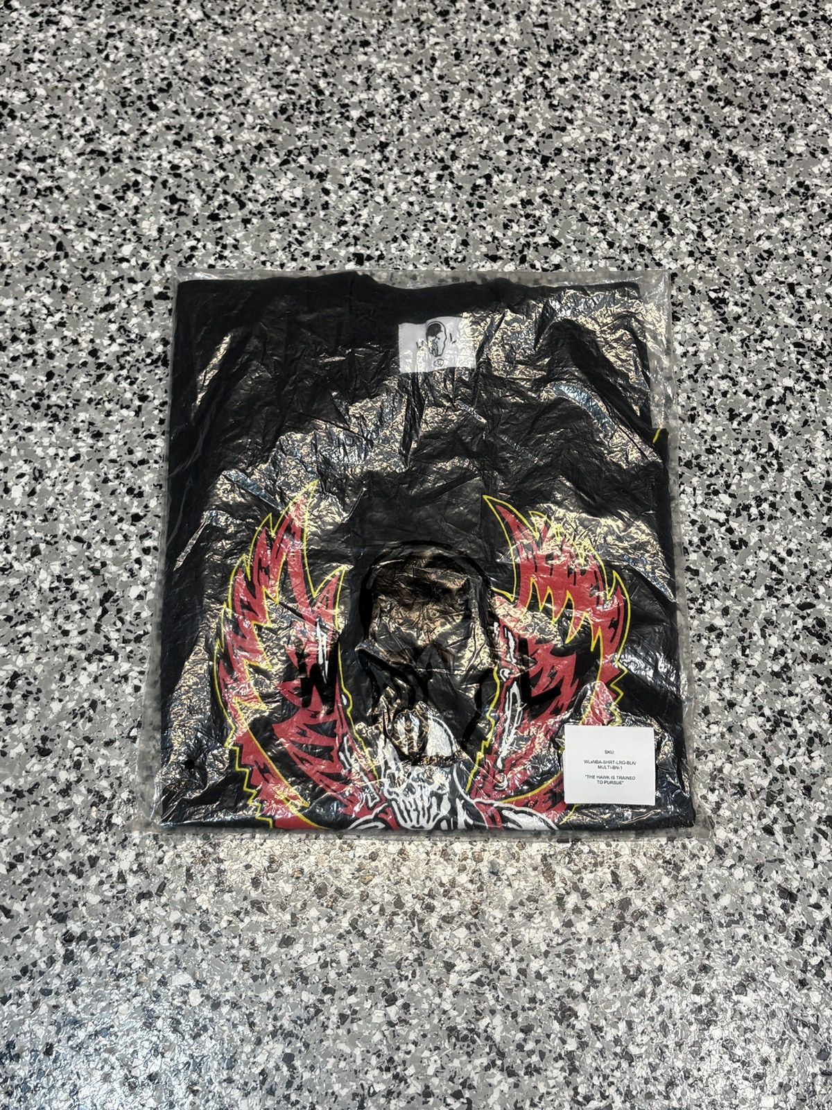 NBA × Warren Lotas Warren Lotas X NBA “The Hawk Is Trained To Pursue” Tee Sz. L Size US L / EU 52-54 / 3 - 4 Thumbnail