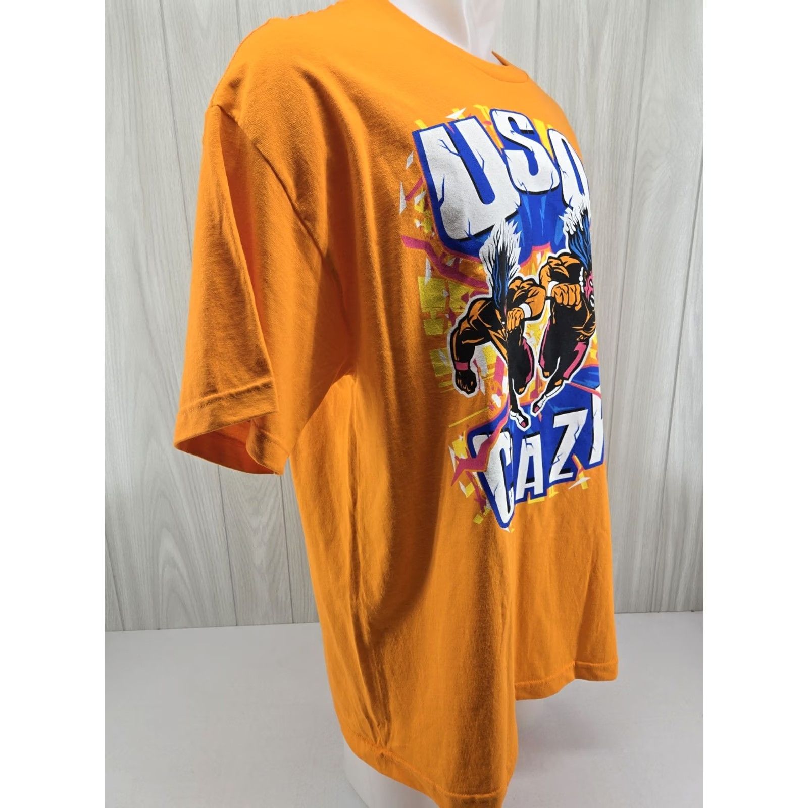 Vintage WWE The Usos T Shirt Usos Crazy Jey Uso Jimmy Uso Orange XL Shirt Men Regular Short Sleeve Graphic Print 2020-2029 Vintage No Size US XL / EU 56 / 4 - 6 Thumbnail