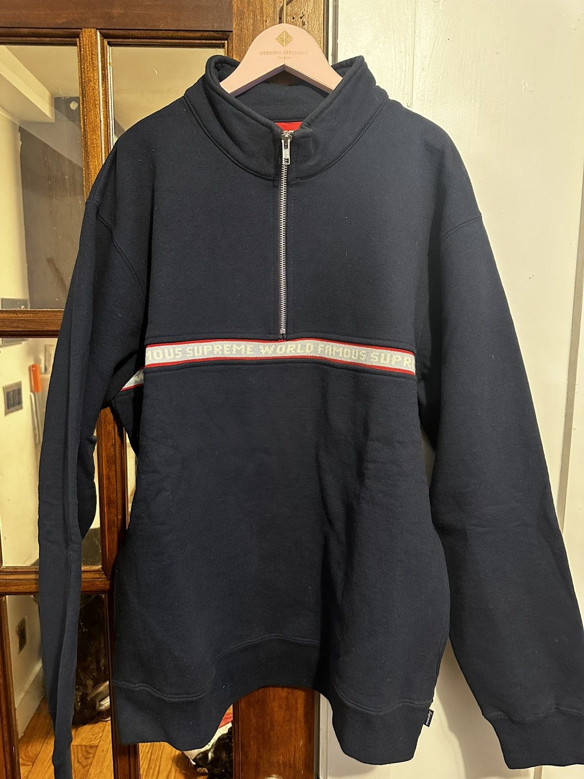 Supreme world famous hot sale half zip pullover