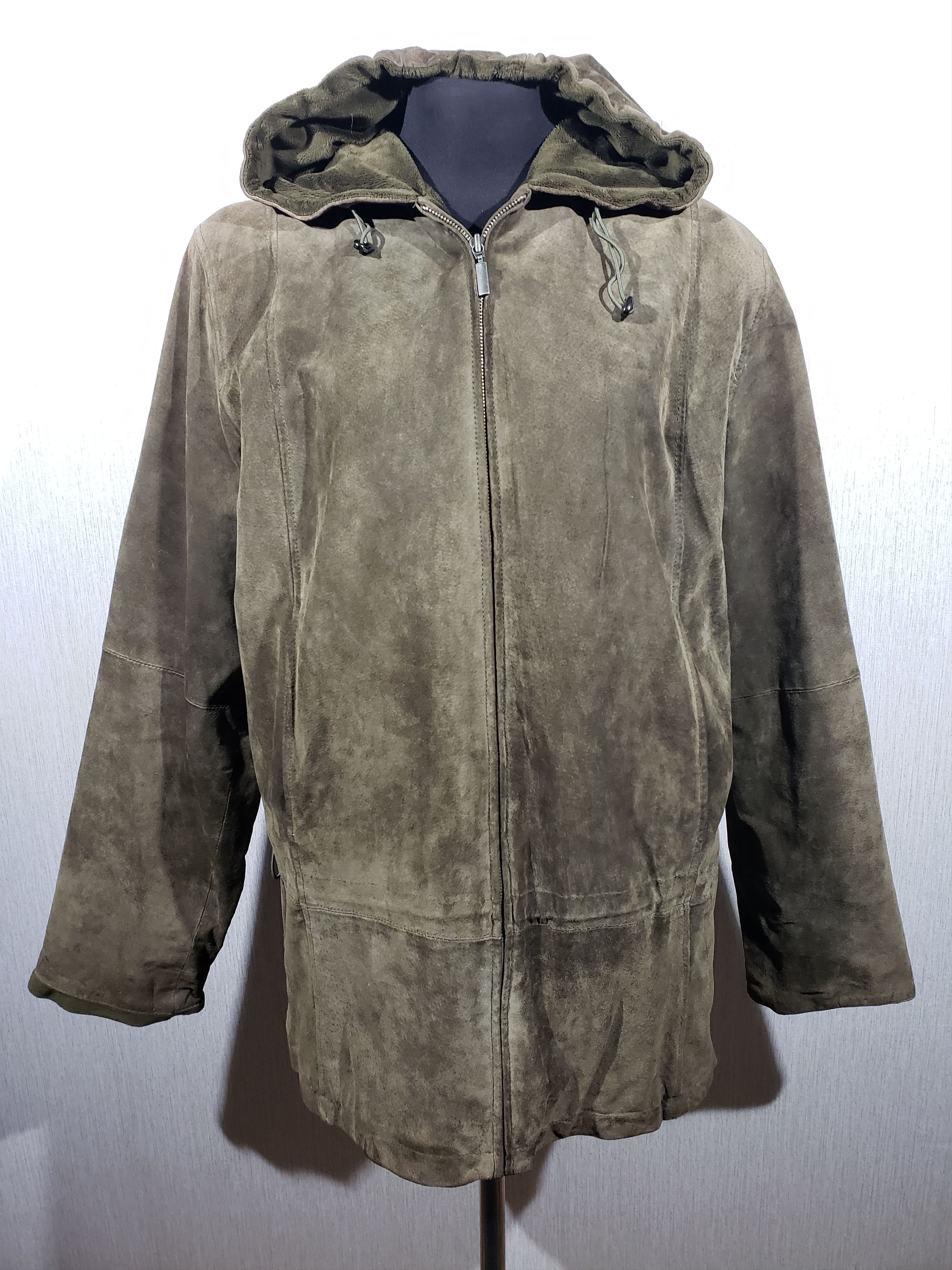 Cozy green women's leather jacket with a hood.