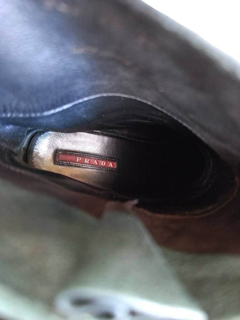 Prada black leather biker boots buckle high