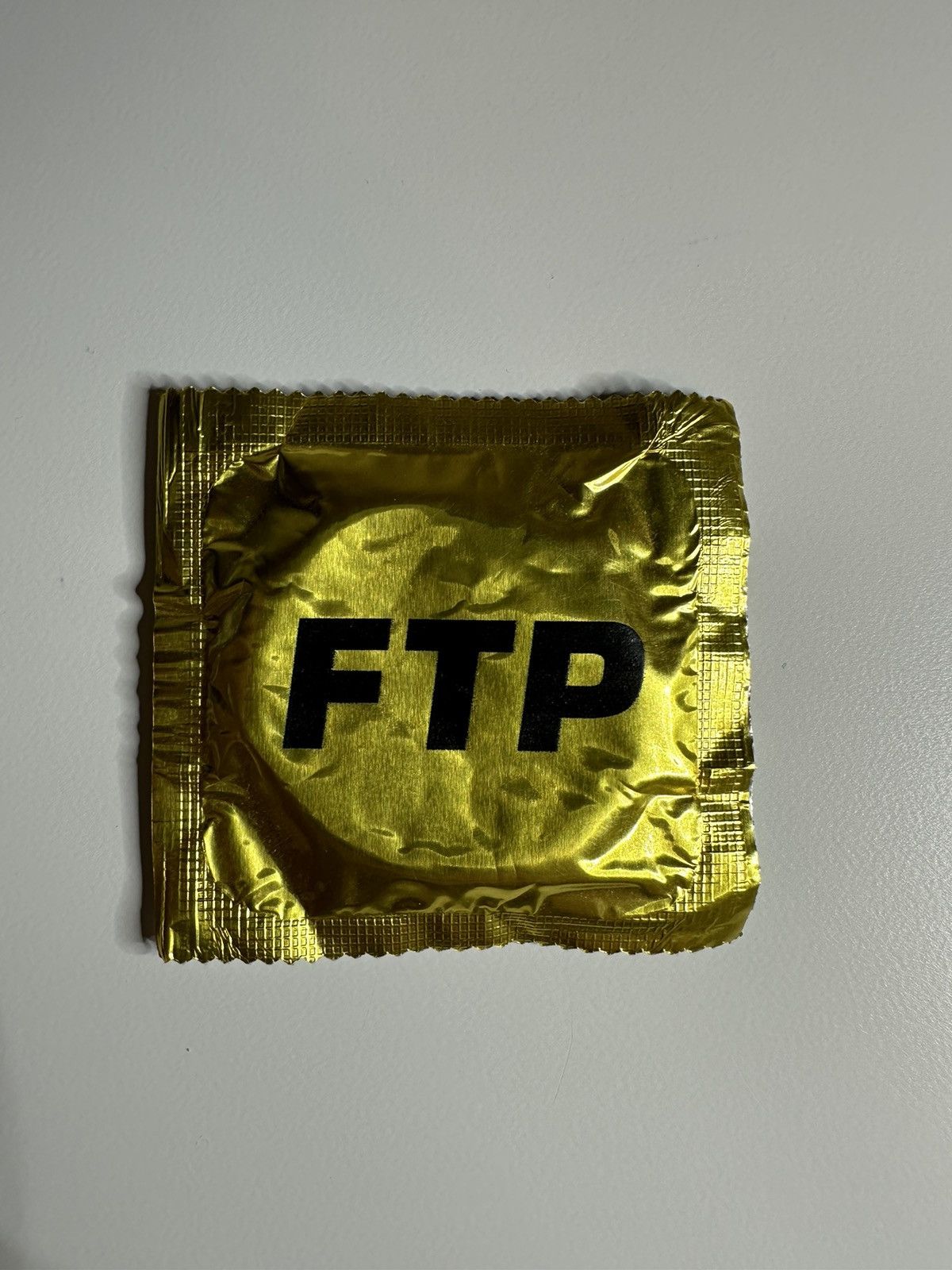 Fuck The Population FTP Gold Condom New Size ONE SIZE - 1 Thumbnail