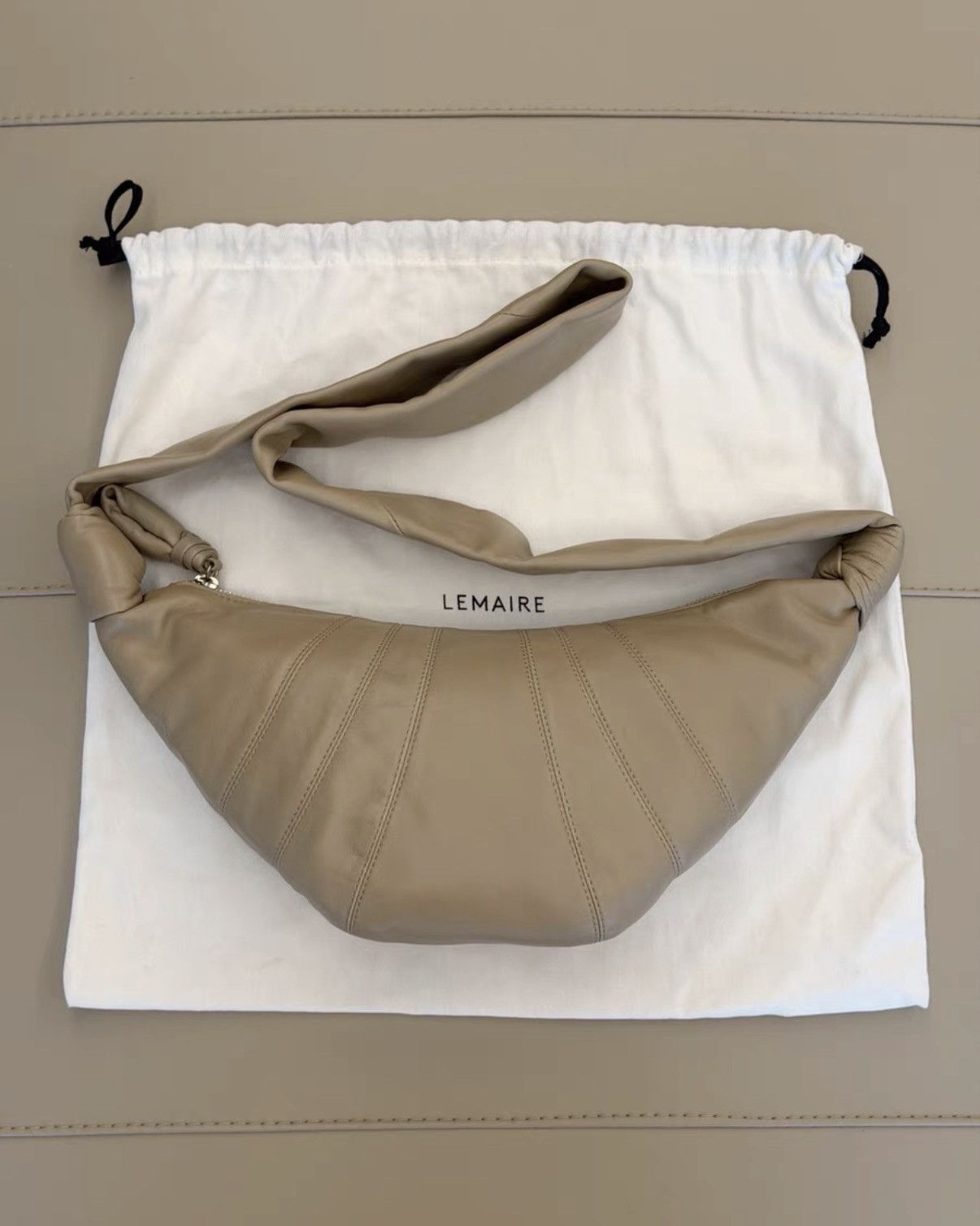 Lemaire Lemaire Sand Lambskin Croissant Crossbody Bag KKKK9 Size ONE SIZE - 1 Thumbnail