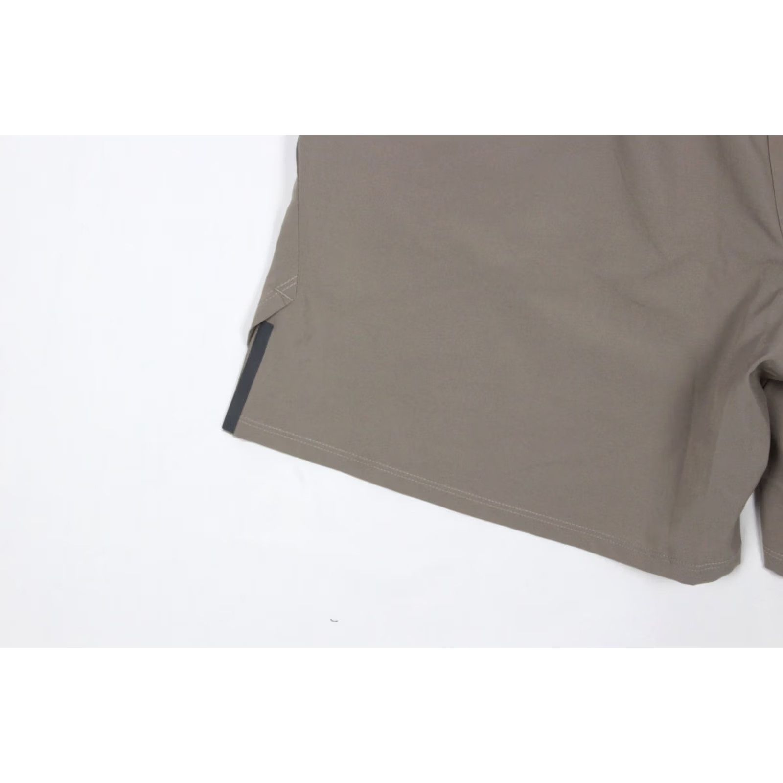 Asics ASICS Men’s 7" Woven Shorts Laser Cut Reflective Brown XL Unlined Running Gym Inseam 7" Regular Fit Size US 36 / EU 52 - 5 Thumbnail