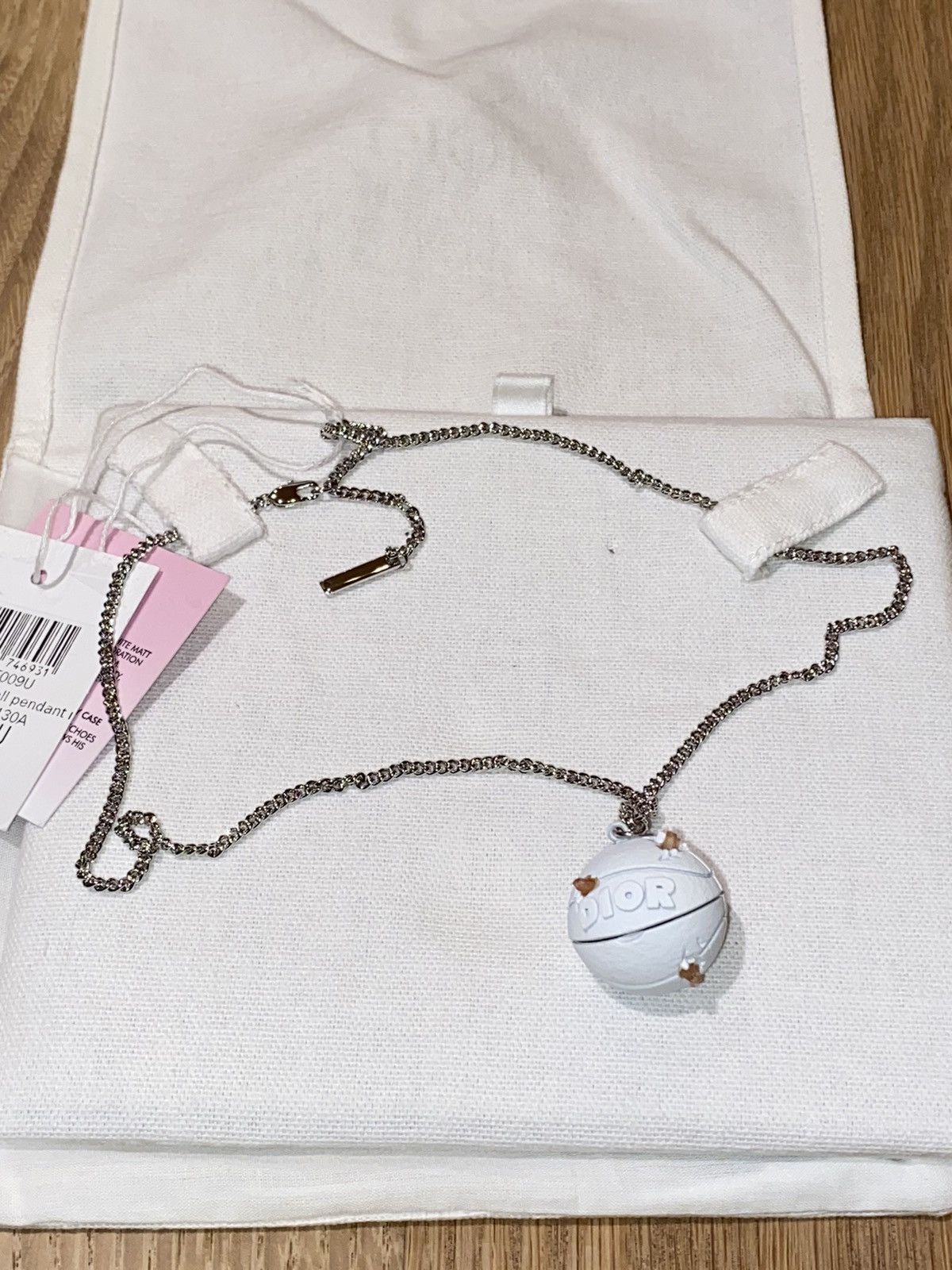 Daniel Arsham × Dior Dior x Daniel Arsham Eroded Basketball Pendant  Necklace | Grailed